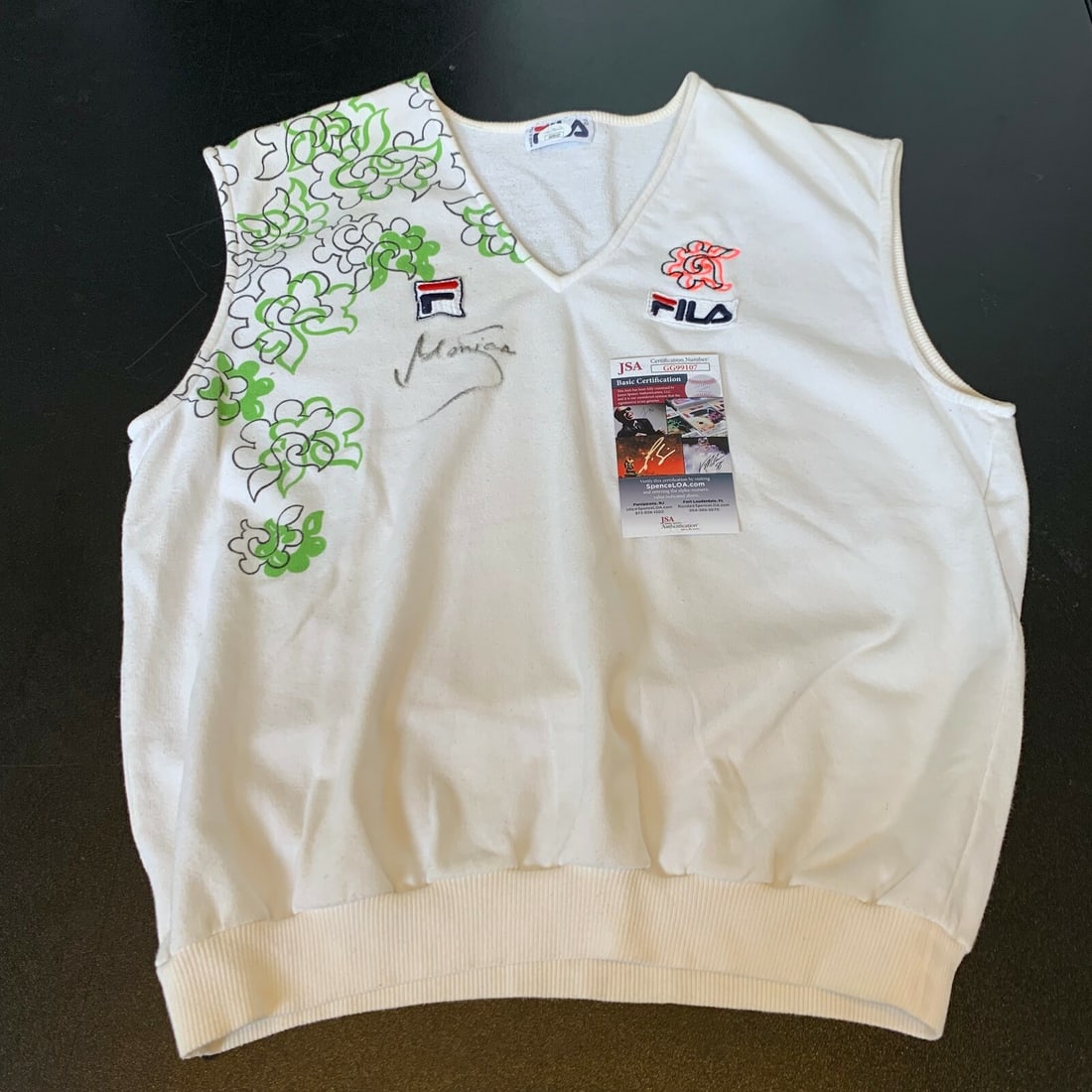 Signed Monica Seles 1992 Wimbledon Match Worn Tennis Shirt JSA: Signed Monica Seles 1992 Wimbledon Match Worn Tennis Shirt JSA Original Monica Seles signed 1992 Wimbledon match-worn game-used tennis shirt jersey. The piece is accompanied by JSA autograph authentic