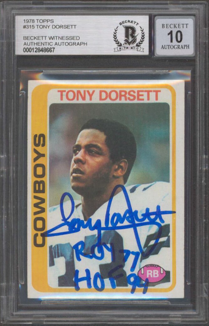Tony Dorsett Signed 1978 Topps Rookie Card BAS Gem Mint 10 ROY HOF Inscription: Tony Dorsett Signed 1978 Topps Rookie Card BAS Gem Mint 10 ROY HOF Inscription This 1978 Topps #315 Rookie Card features Tony Dorsett and is personally signed by him with the inscription "ROY 77, HOF 