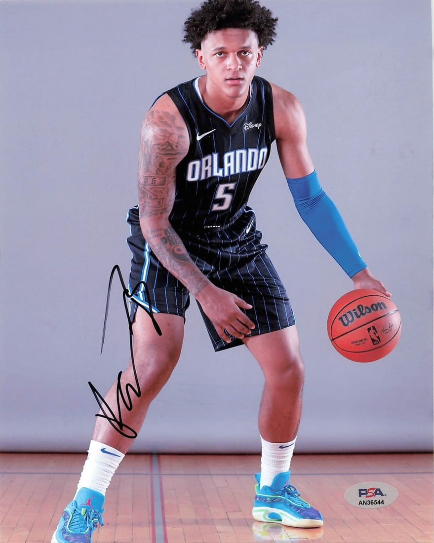 Paolo Banchero Autographed 8x10 Photo PSA/DNA Orlando Magic: Paolo Banchero Autographed 8x10 Photo PSA/DNA Orlando Magic This is an original 8x10 photograph signed by Paolo Banchero, a rising star of the Orlando Magic. The autograph has been authenticated by PS