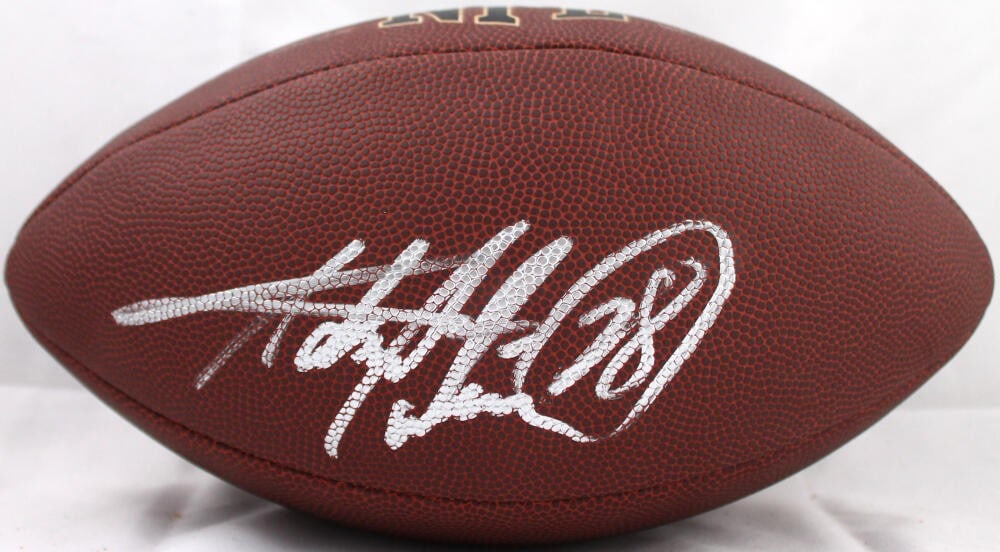 Wilson NFL Super Grip Football Signed by Adrian Peterson Beckett Hologram: Wilson NFL Super Grip Football Signed by Adrian Peterson Beckett Hologram Autographed Wilson NFL Super Grip football featuring Adrian Peterson. This pre-owned football is authenticated by Beckett Auth