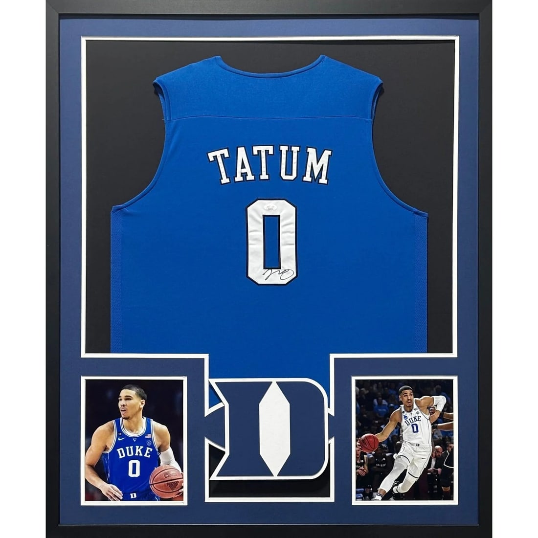 Framed Jayson Tatum Autographed Duke Jersey JSA Authenticated: Framed Jayson Tatum Autographed Duke Jersey JSA Authenticated Pre-owned framed Jayson Tatum autographed jersey with JSA authentication. This display piece features detailed framing and a logo presenta