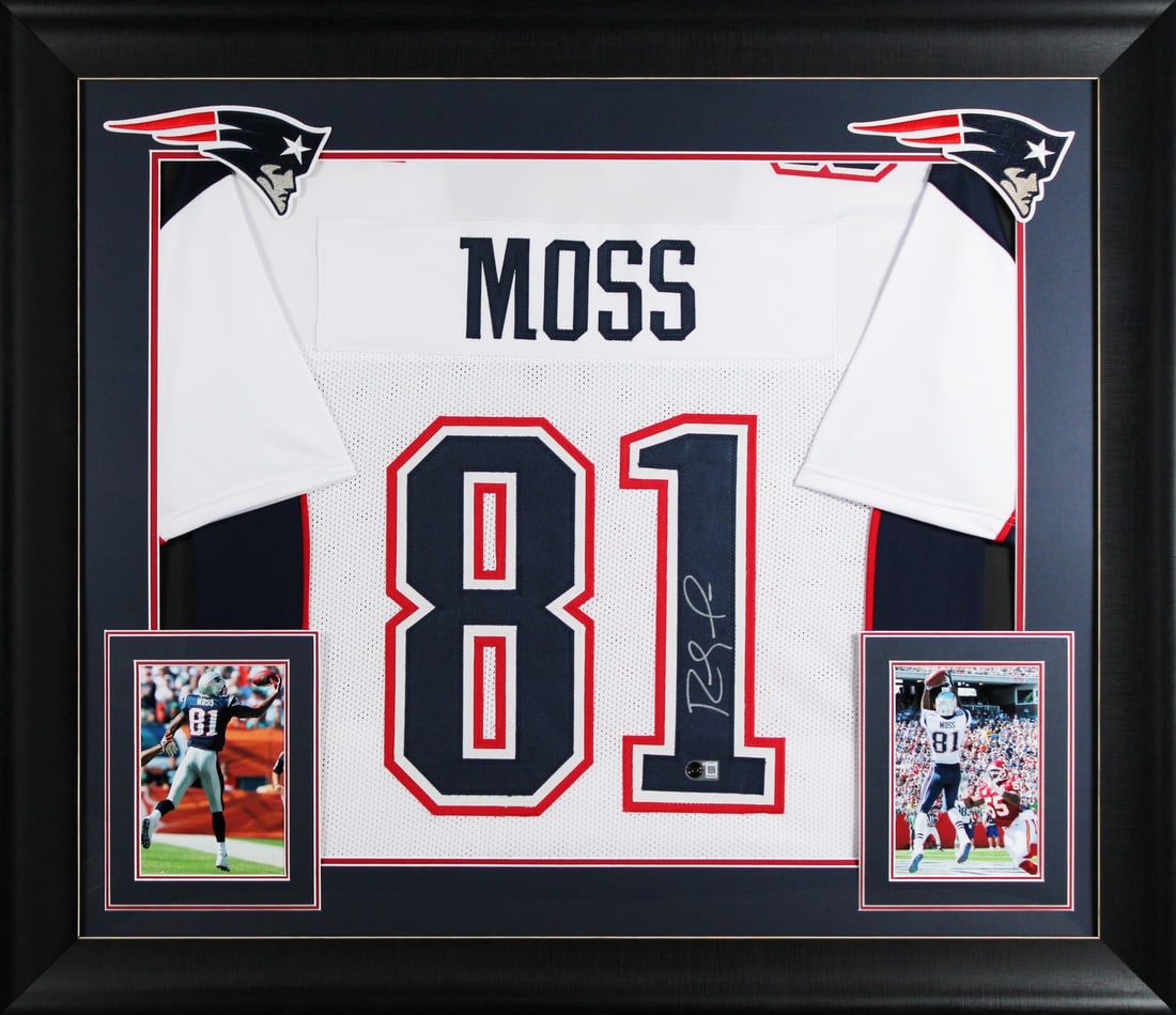 Framed Randy Moss Signed White Pro Style Jersey Beckett Witnessed: Framed Randy Moss Signed White Pro Style Jersey Beckett Witnessed Autographed white pro style framed jersey personally signed by Randy Moss of the New England Patriots. It is an original item with Bec