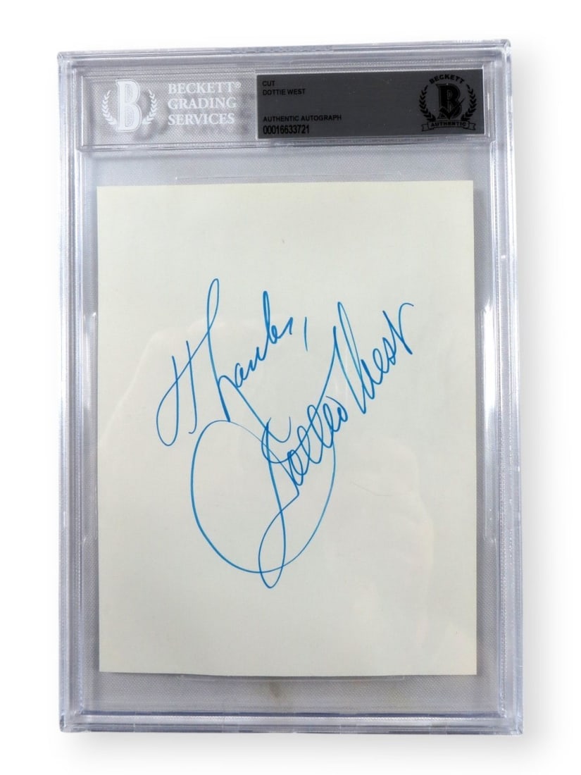 Beckett Authenticated Dottie West Original Cut Signature Encased: Beckett Authenticated Dottie West Original Cut Signature Encased Authentic Dottie West signed cut signature, professionally authenticated by Beckett Authentication and presented in an encased display.