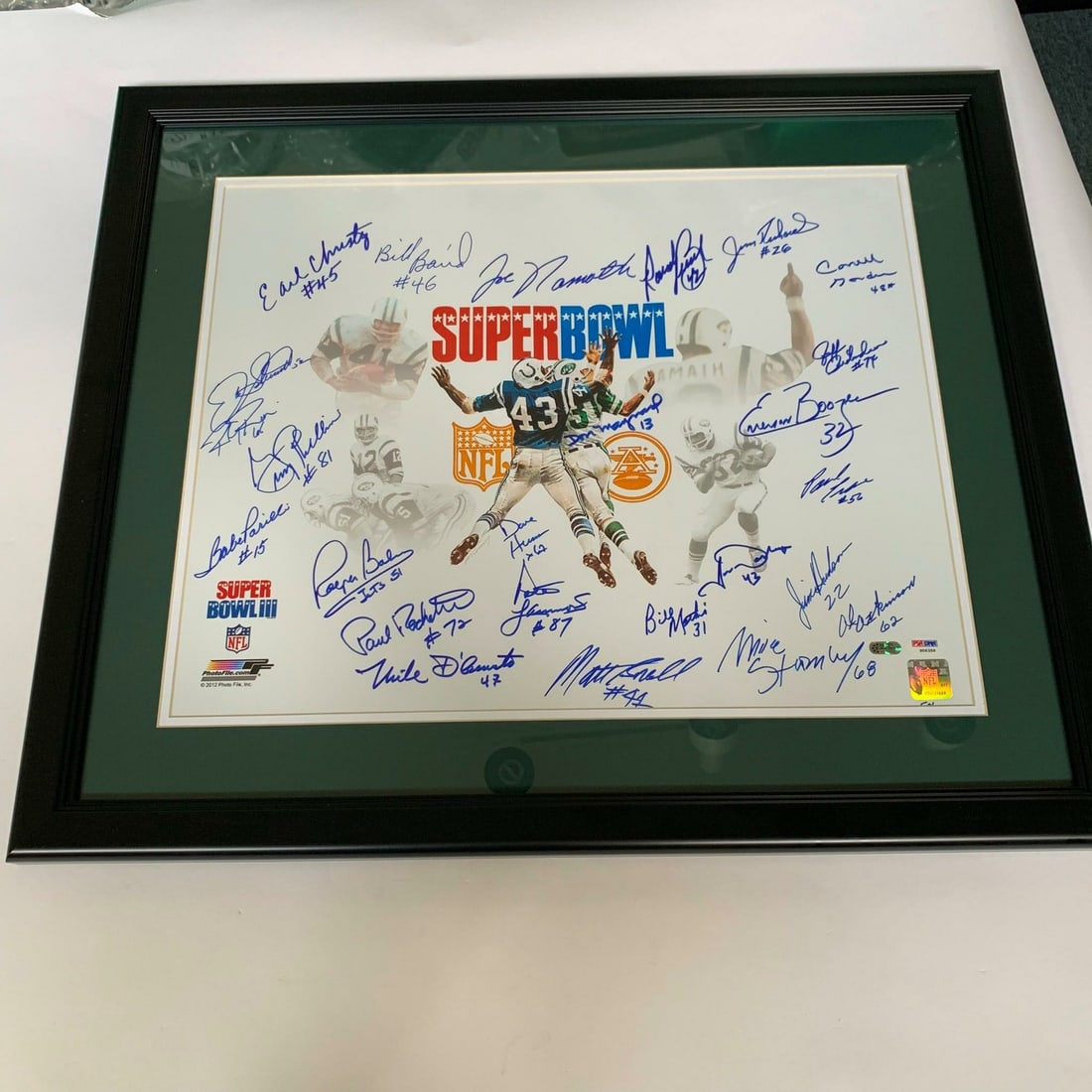 Framed Super Bowl III Photo 1968 New York Jets Team Signed PSA DNA: Framed Super Bowl III Photo 1968 New York Jets Team Signed PSA DNA Framed 16x20 photograph commemorating the 1968 New York Jets Super Bowl Champs, signed by team members and accompanied by a PSA/DNA s