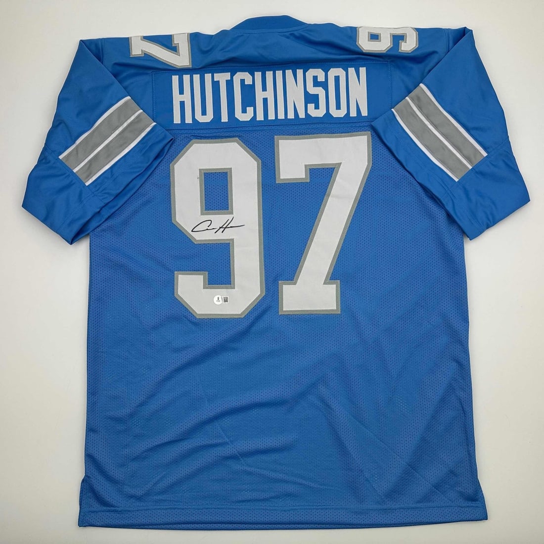 Beckett COA Aidan Hutchinson signed blue Detroit Lions custom football jersey: Beckett COA Aidan Hutchinson signed blue Detroit Lions custom football jersey Autographed Aidan Hutchinson custom Detroit blue current jersey with Beckett authentication. This pre-owned collectible je