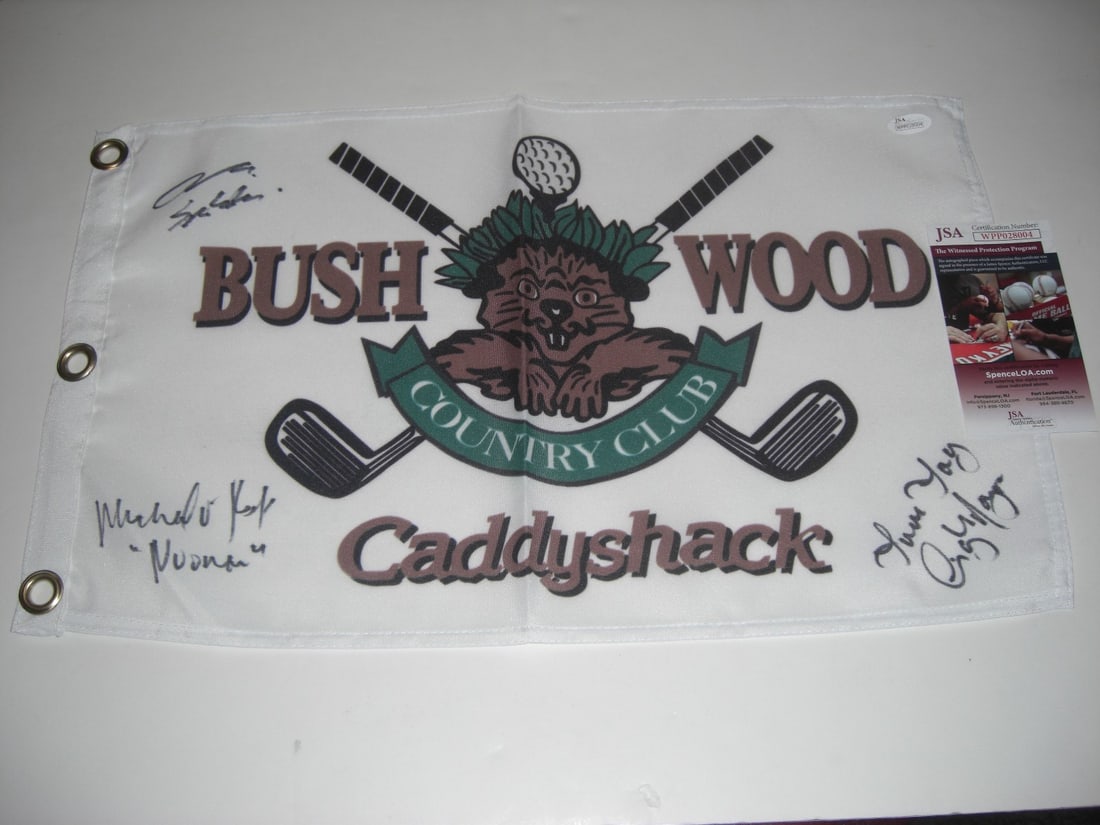 Caddyshack Golf Flag Autographed by Michael O'Keefe Cindy Morgan John Barman JSA COA: Caddyshack Golf Flag Autographed by Michael O'Keefe Cindy Morgan John Barman JSA COA This is an original golf flag signed by Michael O'Keefe, Cindy Morgan, and John Barman from the film Caddyshack. Th