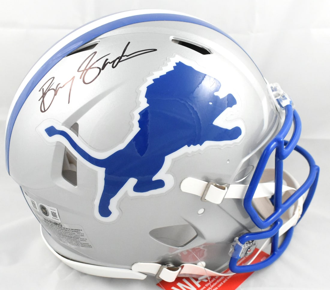 Detroit Lions F S Speed Authentic Helmet signed by Barry Sanders BAS: Detroit Lions F S Speed Authentic Helmet signed by Barry Sanders BAS Pre-owned full-size Speed Authentic helmet signed by Barry Sanders and featuring Detroit Lions team styling. The autograph is authe