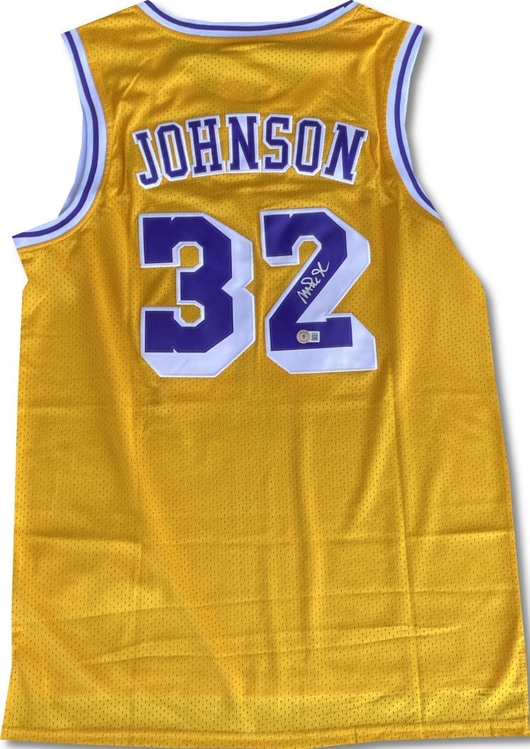 Los Angeles Lakers Gold Swingman Jersey Signed by Magic Johnson Beckett: Los Angeles Lakers Gold Swingman Jersey Signed by Magic Johnson Beckett Pre-owned gold Hardwood Classic Swingman jersey signed by Magic Johnson. This original autographed Los Angeles Lakers jersey is 