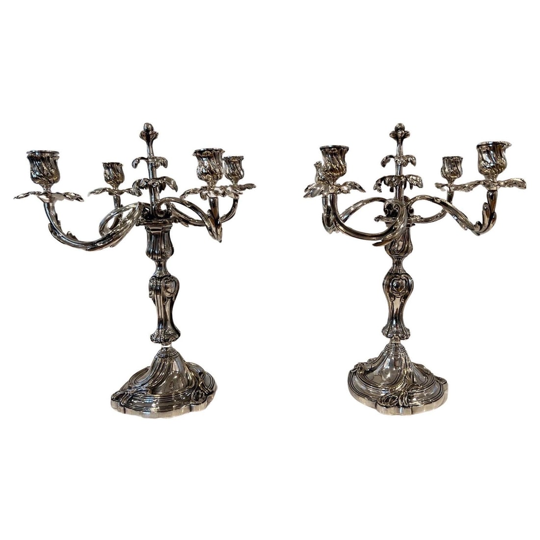 Set of 2 Christofle Trianon Silver Plate Candelabra Louis XIV Style: Set of 2 Christofle Trianon Silver Plate Candelabra Louis XIV Style This exquisite pair of French Christofle "Trianon" silver plate candelabra embodies the elegance of Louis XIV style. Each candelabru