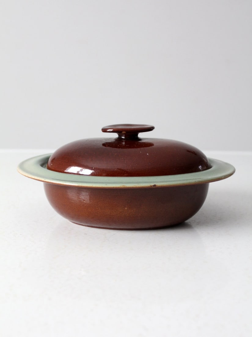 Vintage Red Wing Country Fare Serving Dish Oval with Lid: Vintage Red Wing Country Fare Serving Dish Oval with Lid This vintage Red Wing Country Fare serving dish showcases a warm brown glaze with a soft celadon interior, providing a charming accent for any 