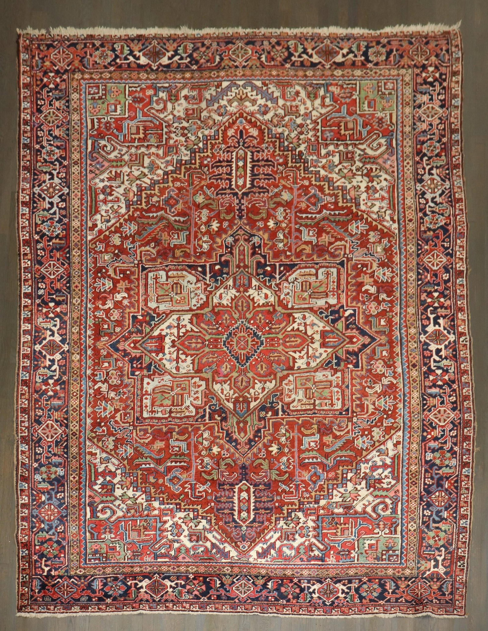 Traditional Persian Heriz Rug: Traditional Persian Heriz Rug 1920s Persian Heriz rug in traditional red and blue tones Dimensions: 8' 4" x 10' 9" (254 x 328 cm) Type: Serapi/Heriz Category: Room Condition: Pre-Owned