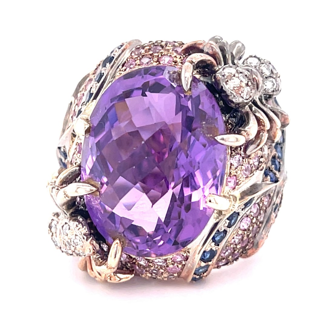 Cocktail Ring 18k White Gold with 20 ct Amethyst Sapphire Diamond: Cocktail Ring 18k White Gold with 20 ct Amethyst Sapphire Diamond Striking cocktail ring crafted in 18k white gold, centered by an approximately 20 ct cushion-cut amethyst in a prong setting. The desi