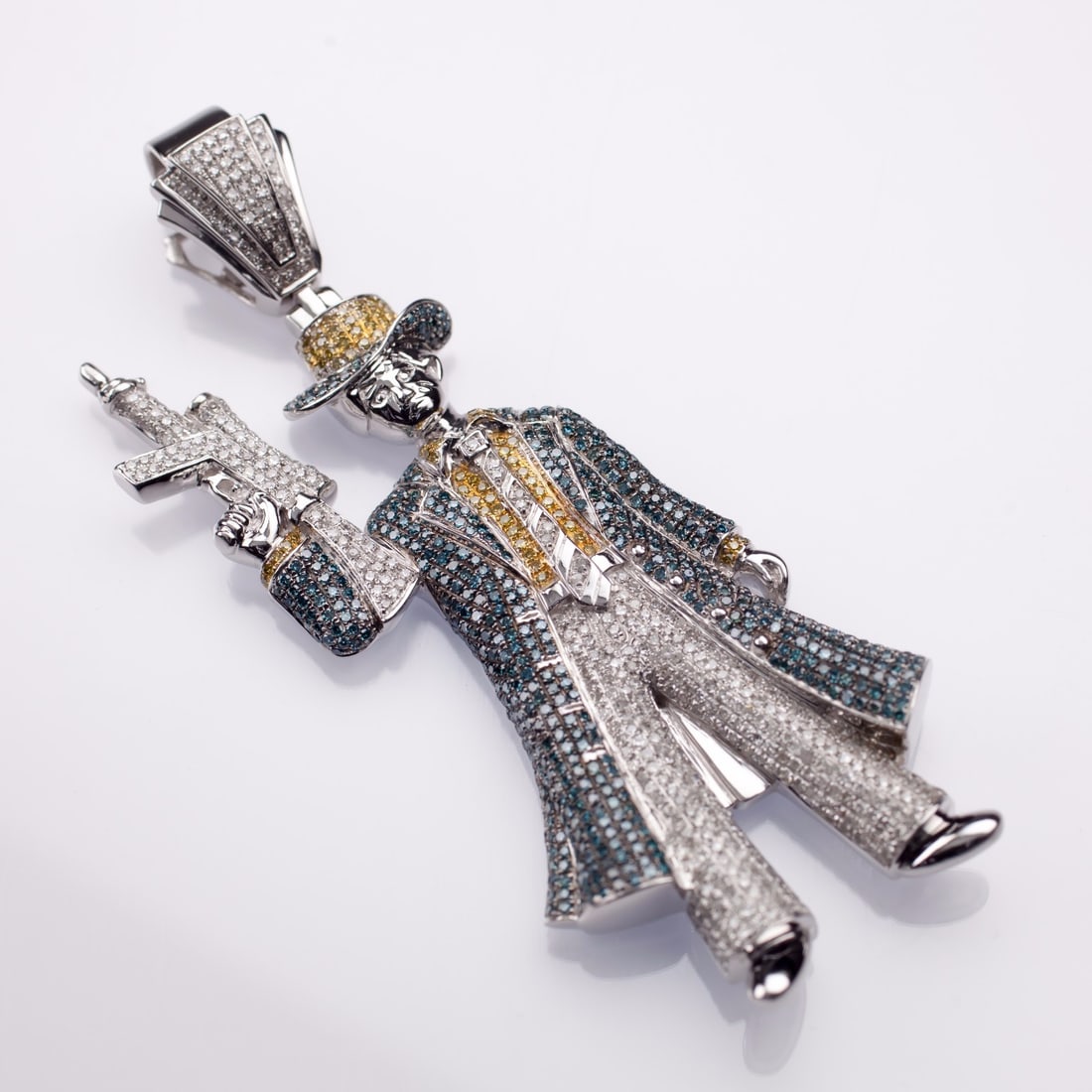 Unbranded 10k White Gold Gangster Pendant with Enhanced Diamond Pave: Unbranded 10k White Gold Gangster Pendant with Enhanced Diamond Pave Pre-owned gangster pendant in 10k white gold, encrusted with round diamonds in white, yellow, and blue tones. The colored diamonds 