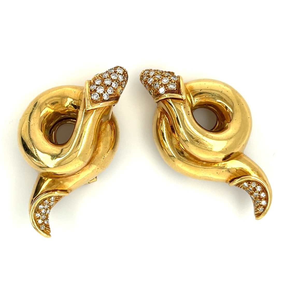 Dior Snake Coil Clip On Earrings 18k Yellow Gold Diamond Accents: Dior Snake Coil Clip On Earrings 18k Yellow Gold Diamond Accents Vintage Christian Dior snake coil earrings in 18k yellow gold with round diamond accents. These clip-on huggie-style earrings have a bo