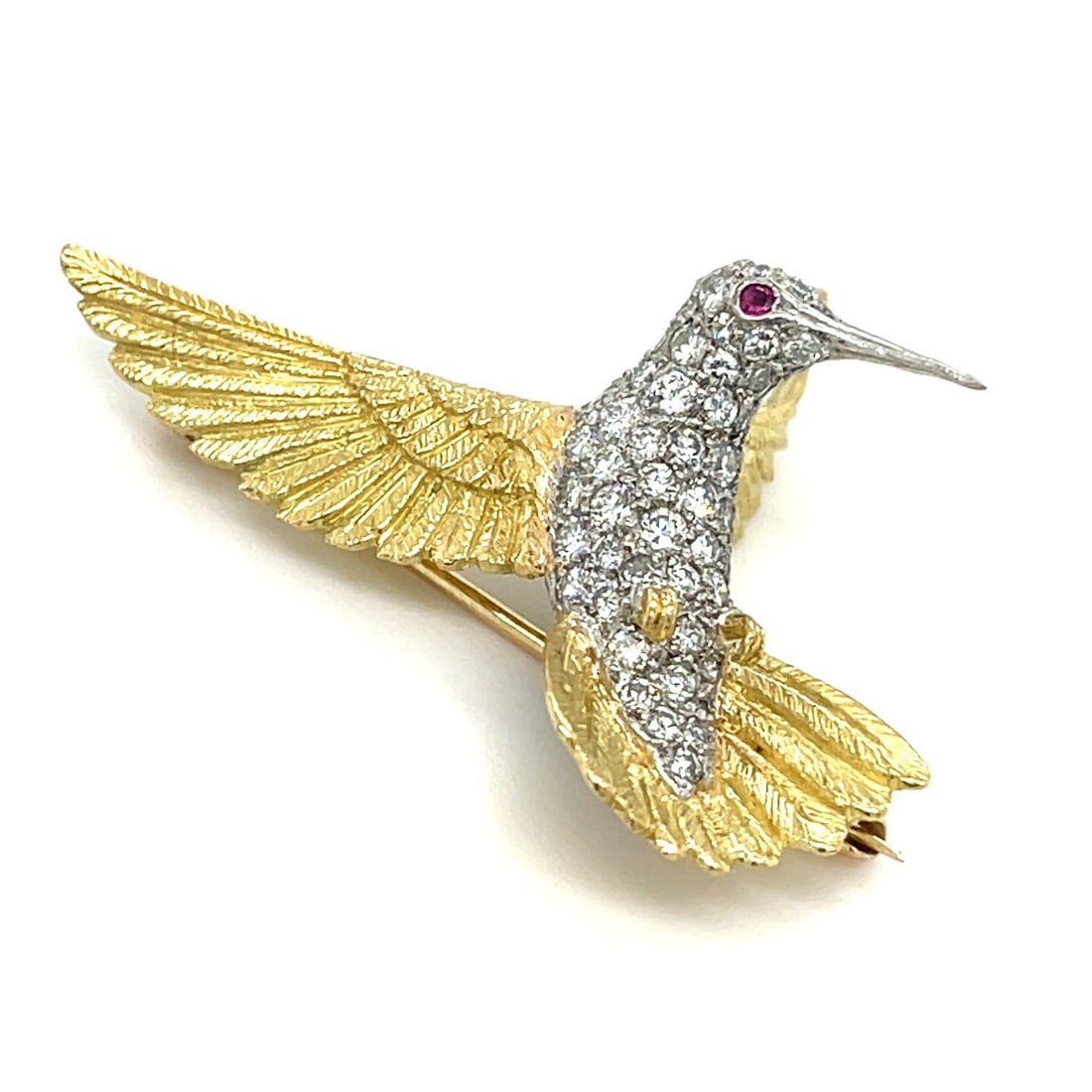 18k Multi Tone Gold Hummingbird Brooch with Diamond and Ruby: 18k Multi Tone Gold Hummingbird Brooch with Diamond and Ruby Sculpted hummingbird brooch in two-tone 18k gold with a pave diamond breast and a ruby accent eye. This pre-owned piece has a striking mult