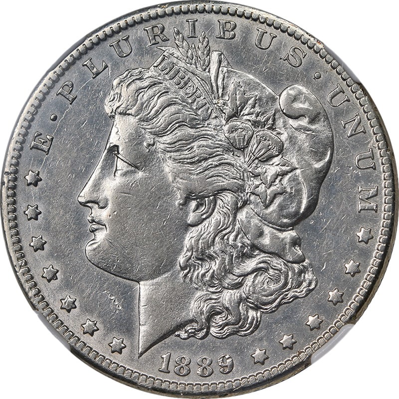 NGC AU Details 1889-CC Morgan Silver Dollar Key Date: NGC AU Details 1889-CC Morgan Silver Dollar Key Date 1889-CC Morgan Silver Dollar certified by NGC and graded AU Details. This key date coin is composed of silver and has bright white eye appeal with 