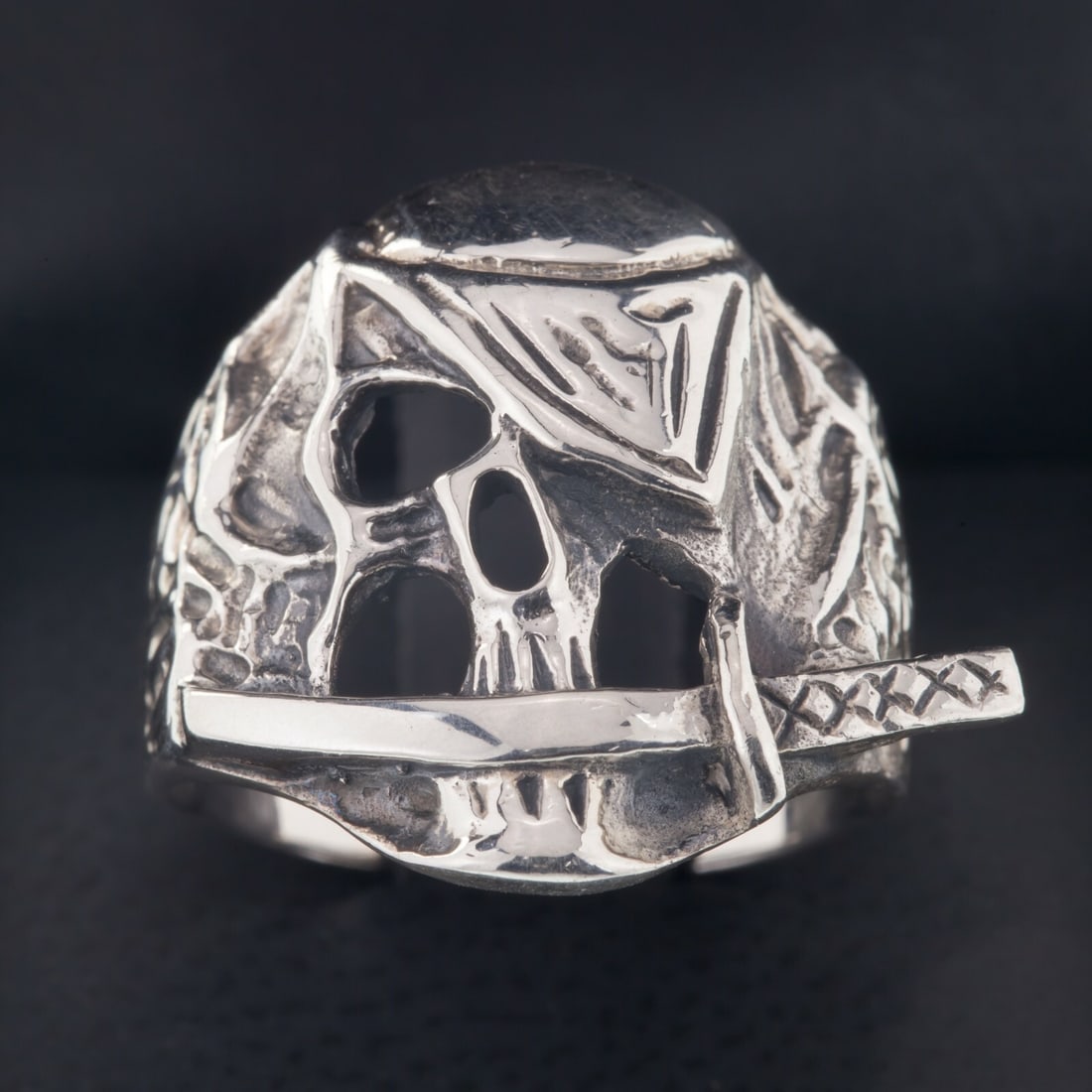 Sterling Silver Pirate Skull Ring with Eye Patch Knife Size 10.25: Sterling Silver Pirate Skull Ring with Eye Patch Knife Size 10.25 Men's biker-style pirate skull ring in sterling silver, featuring an eye patch and a knife across the mouth. This size 10.25 ring has 