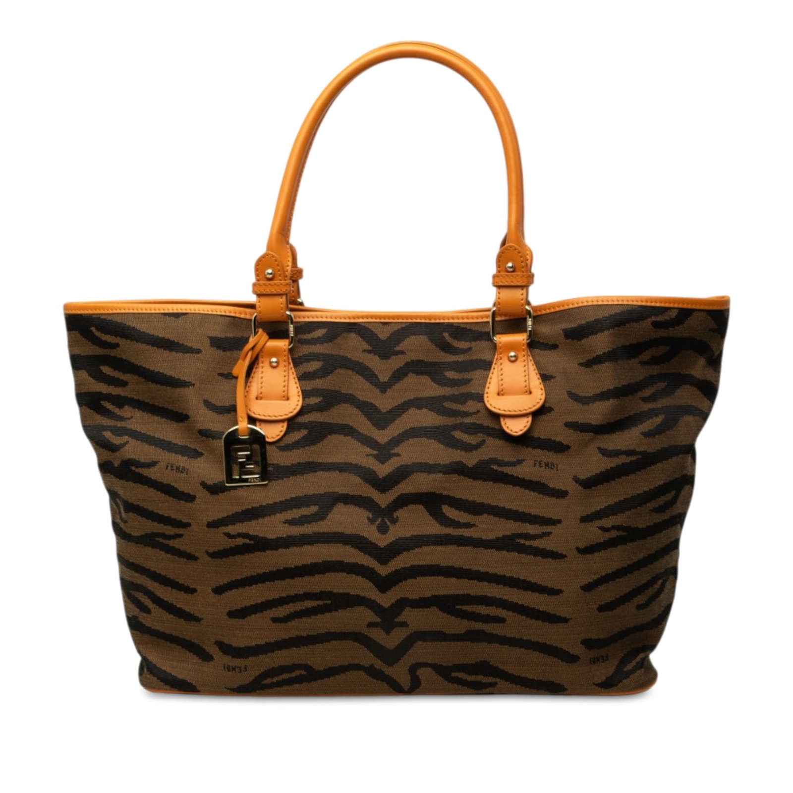 Fendi Zebra Print Tote Bag in Canvas with Leather Trim: Fendi Zebra Print Tote Bag in Canvas with Leather Trim Fendi zebra print canvas tote with leather trim and rolled leather handles. The bag features an open top with a magnetic snap closure and an inte