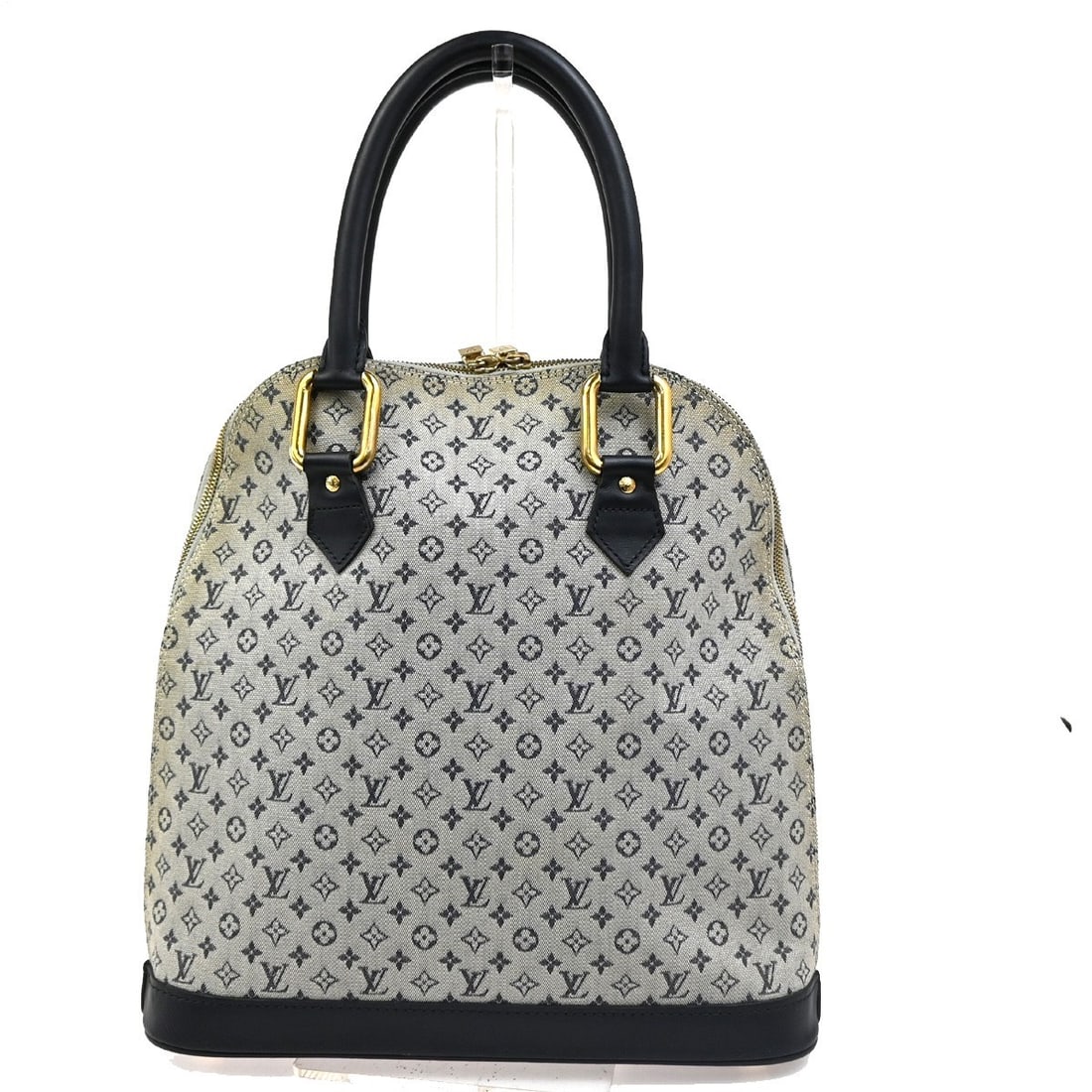 Louis Vuitton Alma blue canvas handbag: Louis Vuitton Alma blue canvas handbag Louis Vuitton Alma Mini Lin handbag in blue canvas with a structured silhouette. Made in France, this piece is in very good condition with light overall signs of