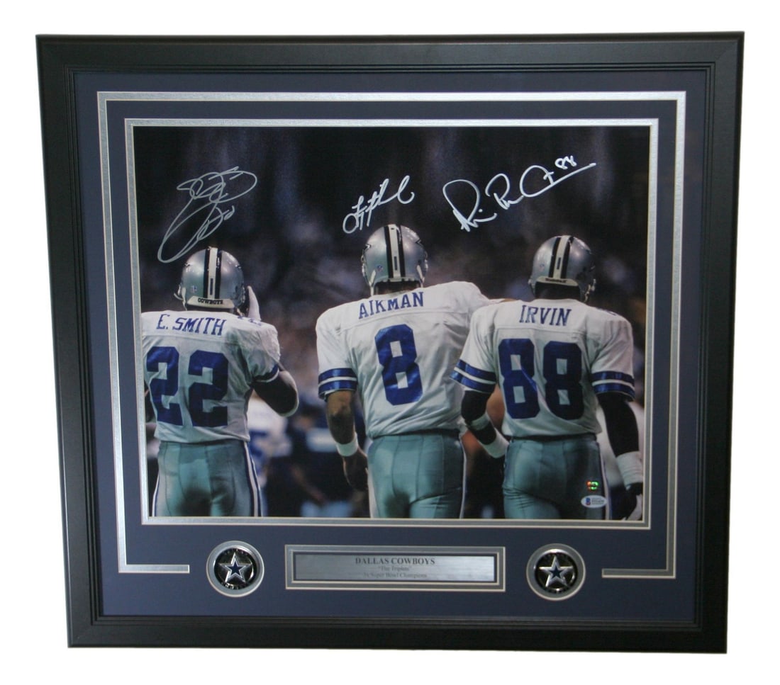 Framed 20x16 Dallas Cowboys photo signed by Aikman Irving Emmitt BAS Prova: Framed 20x16 Dallas Cowboys photo signed by Aikman Irving Emmitt BAS Prova Framed Dallas Cowboys photo signed by Troy Aikman, Michael Irving, and Emmitt Smith. This original football collectible comes