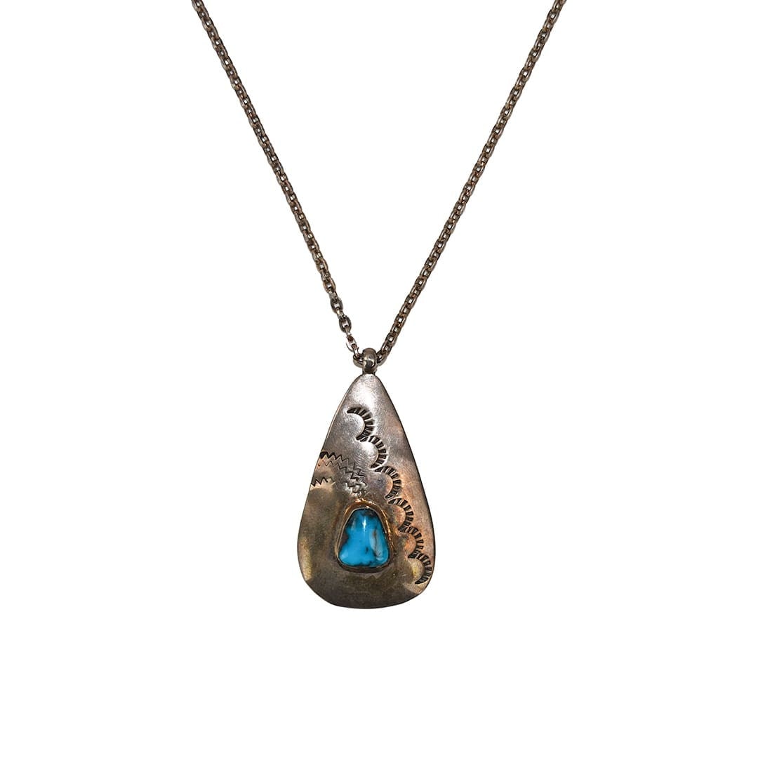 18 in Sterling Silver Necklace with Turquoise Pendant: 18 in Sterling Silver Necklace with Turquoise Pendant Handmade sterling silver necklace featuring a natural turquoise pendant in an antique Native style. The necklace has an 18 inch length with a lobs