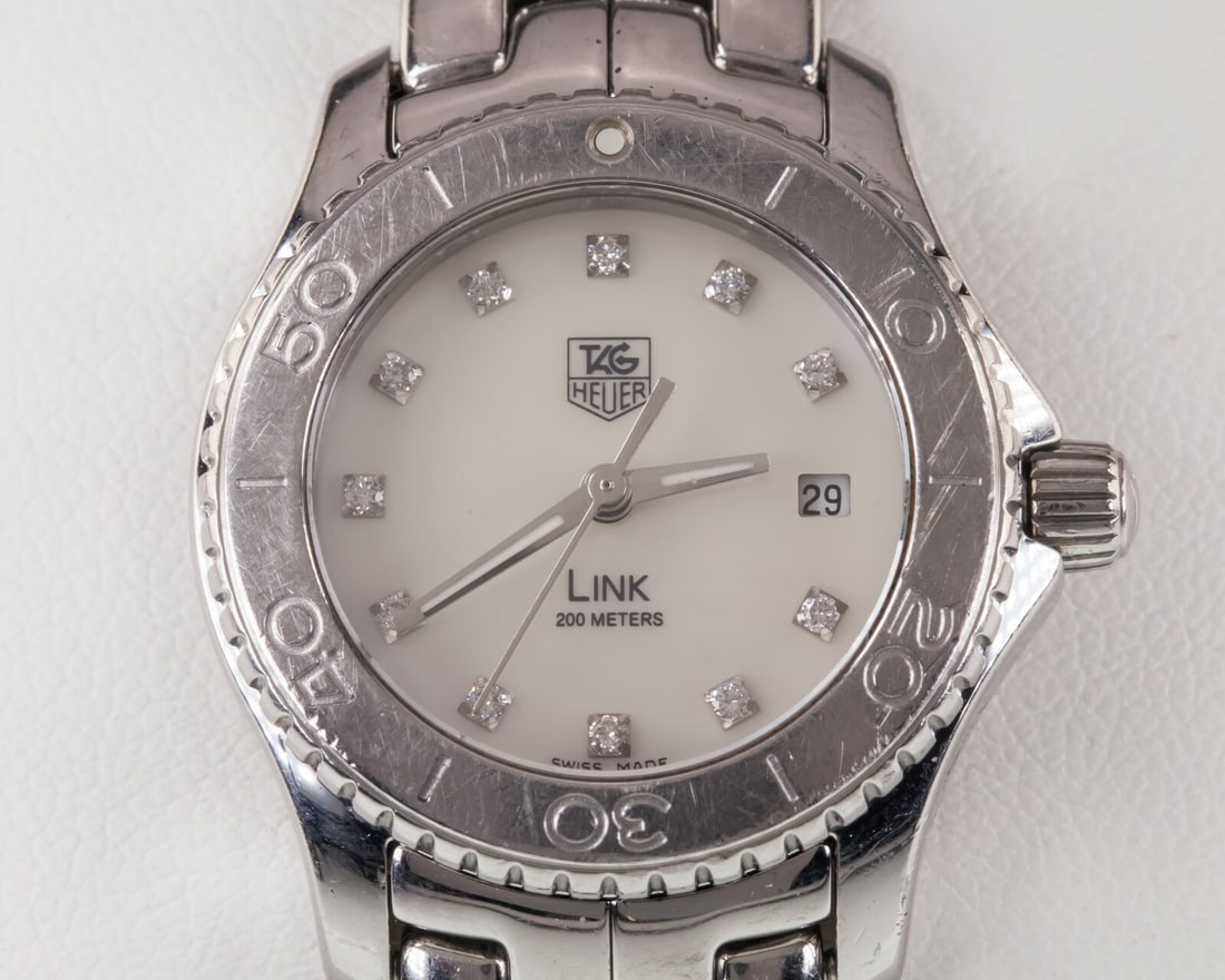 TAG Heuer Link womens quartz wristwatch WJ1319 mother of pearl diamond dial: TAG Heuer Link womens quartz wristwatch WJ1319 mother of pearl diamond dial TAG Heuer Link women's quartz wristwatch with a stainless steel case and bracelet, featuring a mother-of-pearl dial with dia