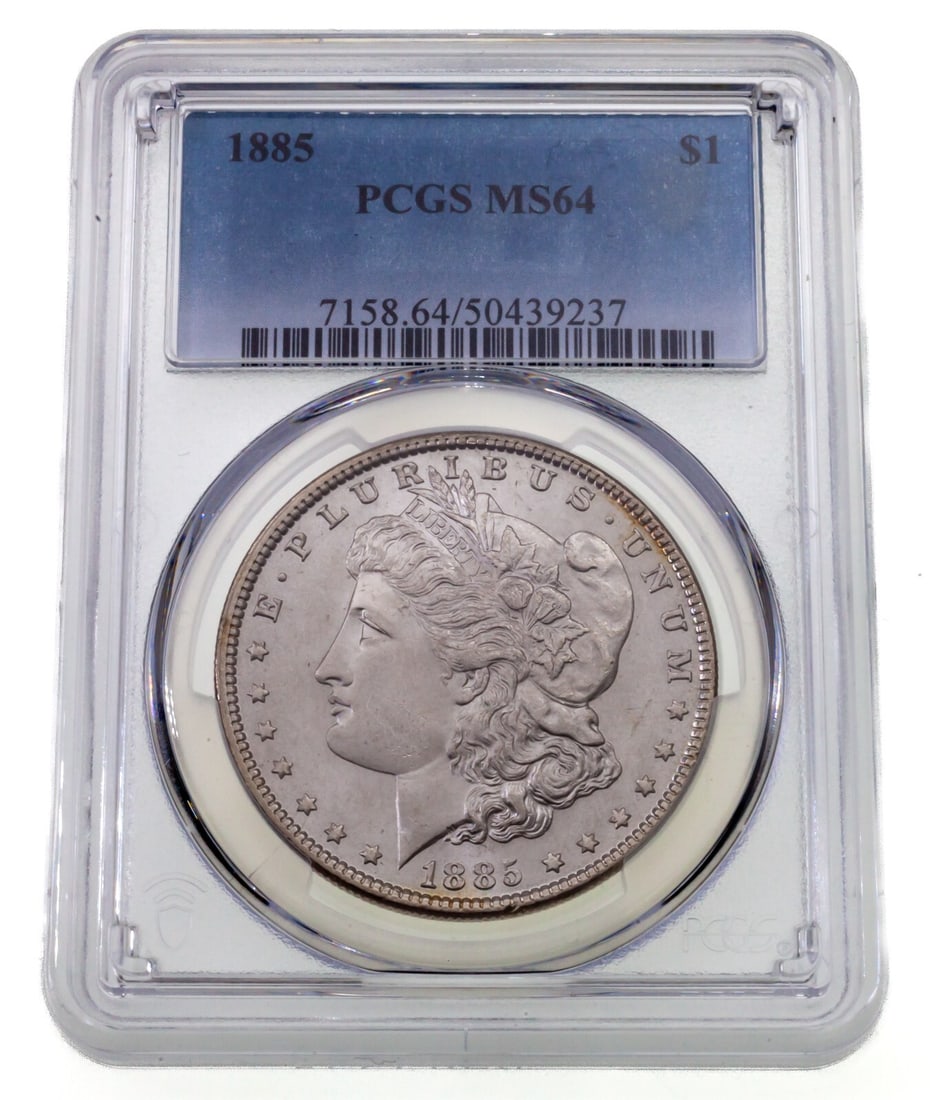 PCGS MS64 1885 Morgan Silver Dollar $1 Philadelphia: PCGS MS64 1885 Morgan Silver Dollar $1 Philadelphia 1885 Morgan Silver Dollar certified by PCGS and graded MS64. This uncirculated $1 coin was minted in Philadelphia and is offered in pre-owned condit