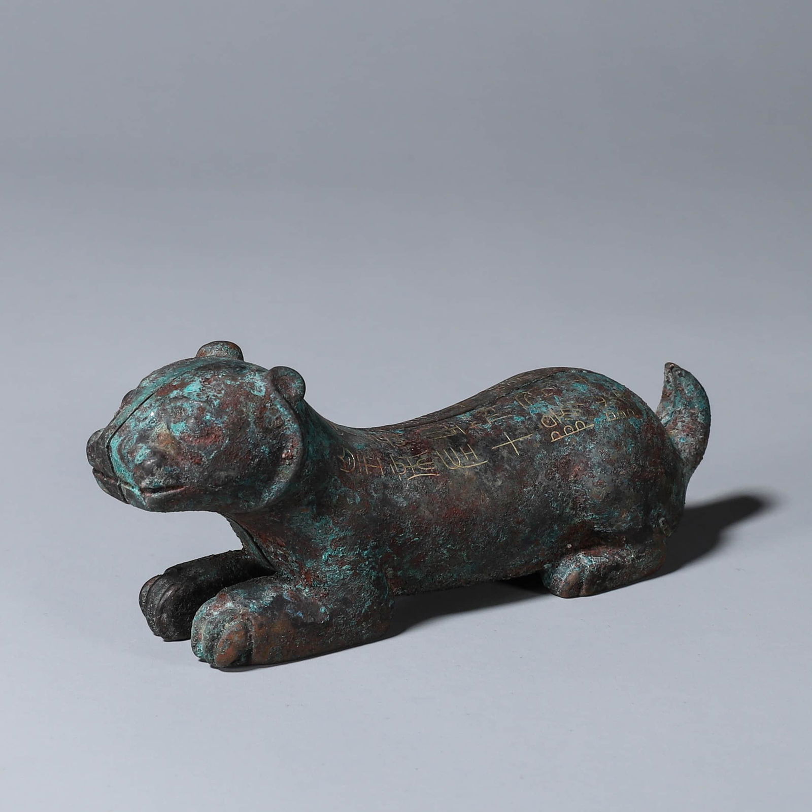 A Gilt Inlaid Chinese Bronze Tiger Symbol (1 of 8)