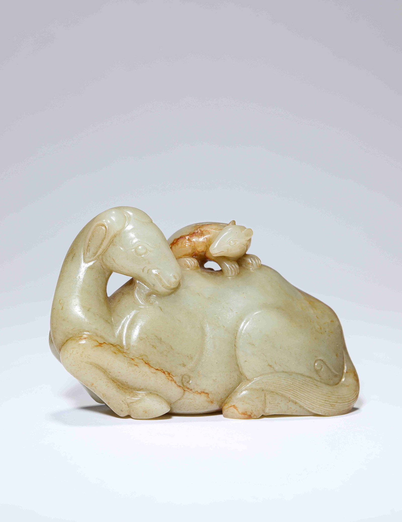 A Jade Camel: A JADE CAMEL Description: Material: Jade Length: 11.9 cm x Width: 4.1 cm x Height: 7.5 cm. All measurements are approximate.