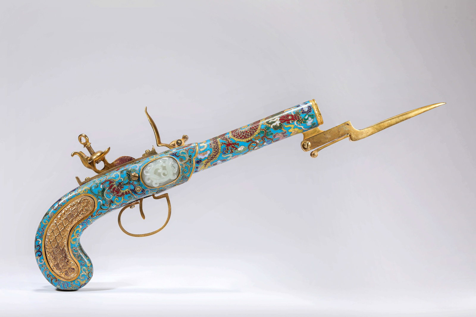 A Cloisonné Enamel 'Dragon' Model Handgonne: A CLOISONNÉ ENAMEL 'DRAGON' MODEL HANDGONNE Dimensions: Dimensions: Weight: 644 g. Length: 38.8 cm x Width: 4.7 cm x Height: 12.5 cm. All measurements are approximate.