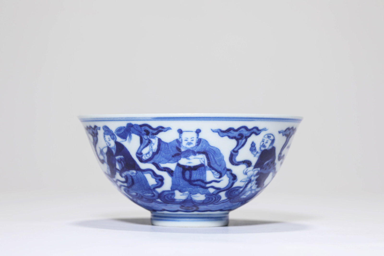 A Blue and White 'Eight Immortals Offering Birthday Greetings' Bowl: A BLUE AND WHITE 'EIGHT IMMORTALS OFFERING BIRTHDAY GREETINGS' BOWL Dimensions: Dimensions: Width: 11.2 cm x Height: 5.4 cm. All measurements are approximate.