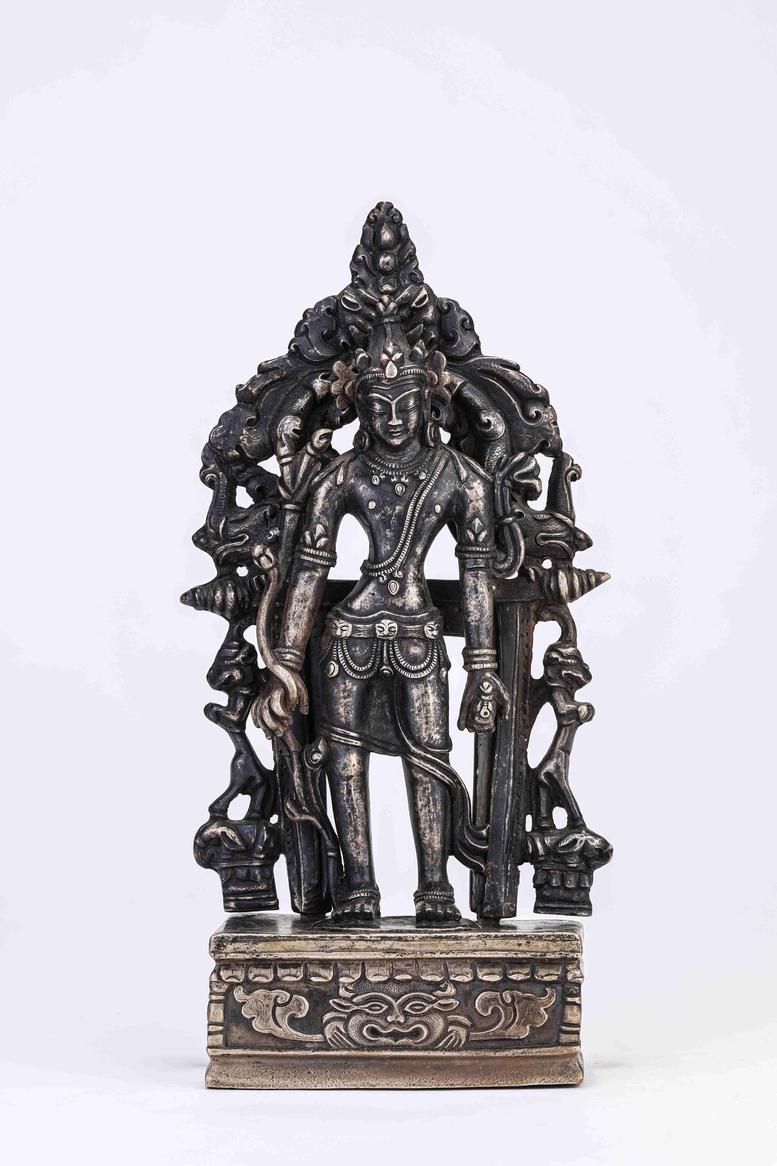 An Alloy Bronze and Silver-Inlaid Figure of Padmapani: AN ALLOY BRONZE AND SILVER-INLAID FIGURE OF PADMAPANI Dimensions: Dimensions: Weight: 2048 g. Length: 12.5 cm x Width: 5.3 cm x Height: 25 cm. All measurements are approximate.
