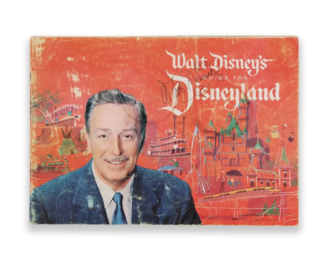 WALT DISNEY - HAND-SIGNED WALT DISNEY'S GUIDE TO DISNEYLAND: WALT DISNEY - HAND-SIGNED WALT DISNEY'S GUIDE TO DISNEYLAND Provenance and Authenticity: This vintage copy of Walt Disney's Guide to Disneyland bears a bold ink signature by Walt Disney across the upp