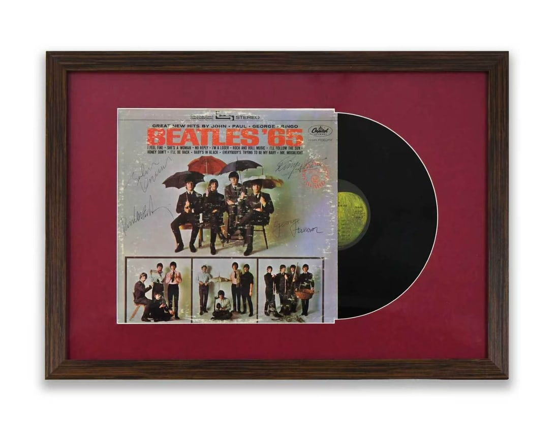THE BEATLES - Fully Signed Beatles '65 (Capitol Records) LP Display: THE BEATLES - FULLY SIGNED BEATLES '65 (CAPITOL RECORDS) LP DISPLAY Provenance and Authenticity: This framed LP display features Beatles '65, signed on the front cover by all four members of The Beatl