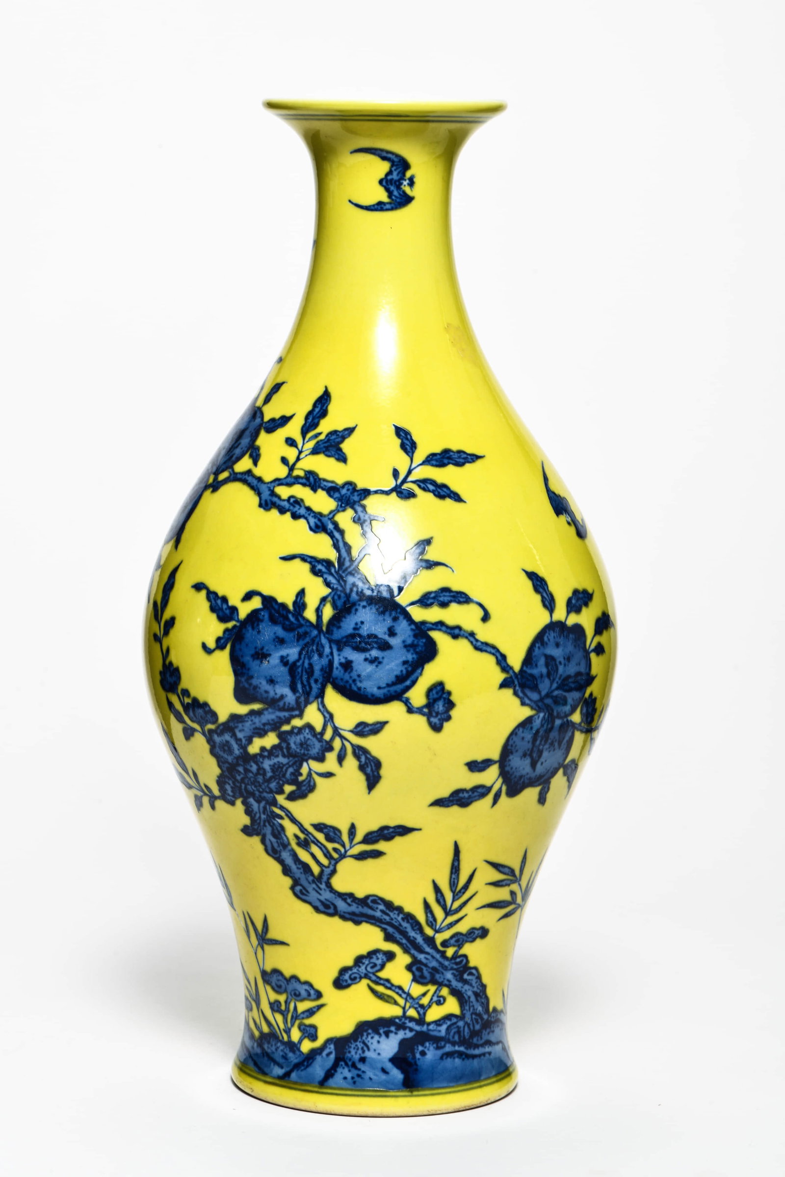 A yellow-ground blue and white 'Bat and shou' olive-shaped vase: A YELLOW-GROUND BLUE AND WHITE 'BAT AND SHOU' OLIVE-SHAPED VASE Description: Width: 18 cm Height: 39 cm