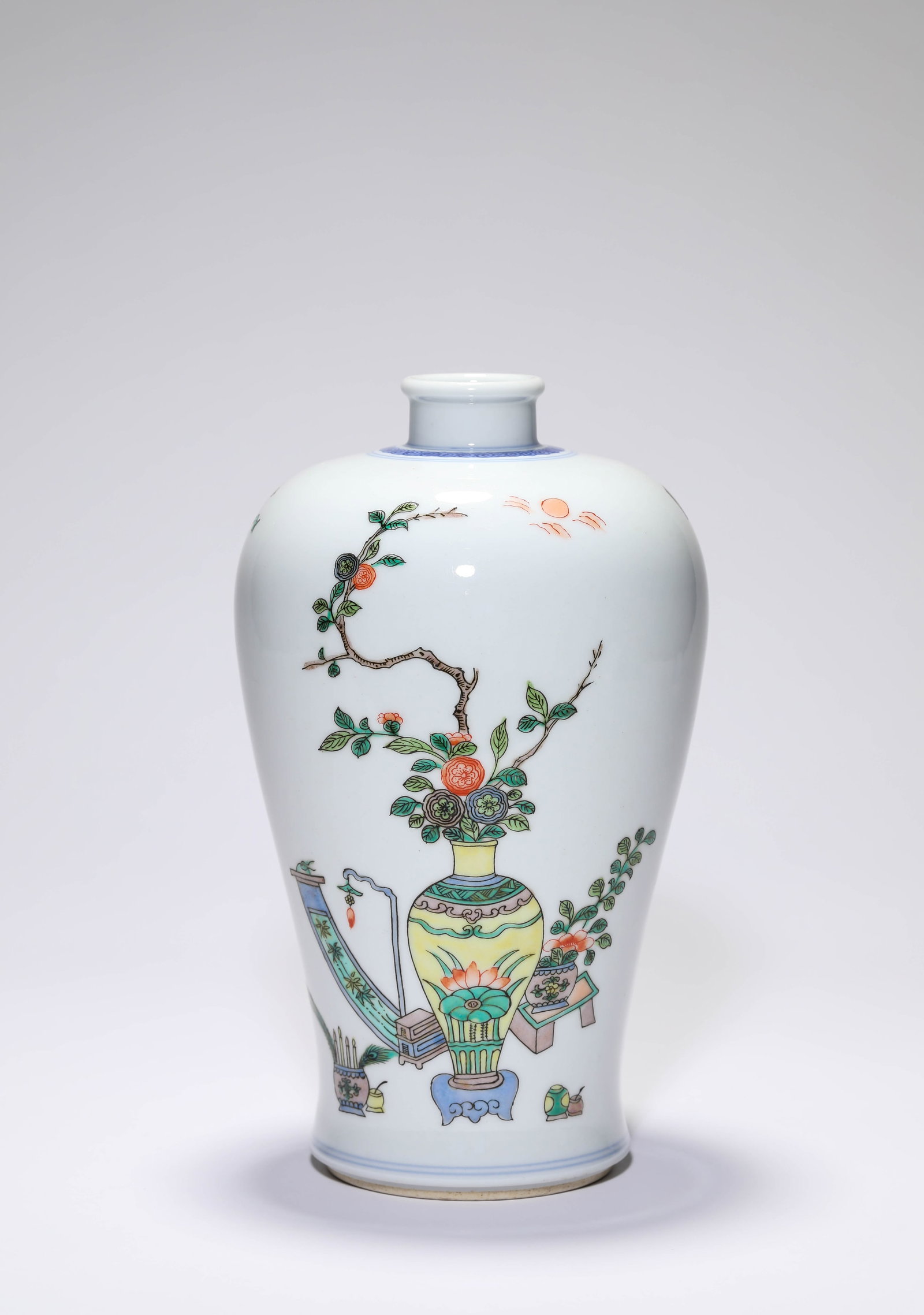 A Wucai 'Antiquities' Meiping: A WUCAI 'ANTIQUITIES' MEIPING Description: Dimensions: Width: 13.8 cm x Height: 23.4 cm. All measurements are approximate.