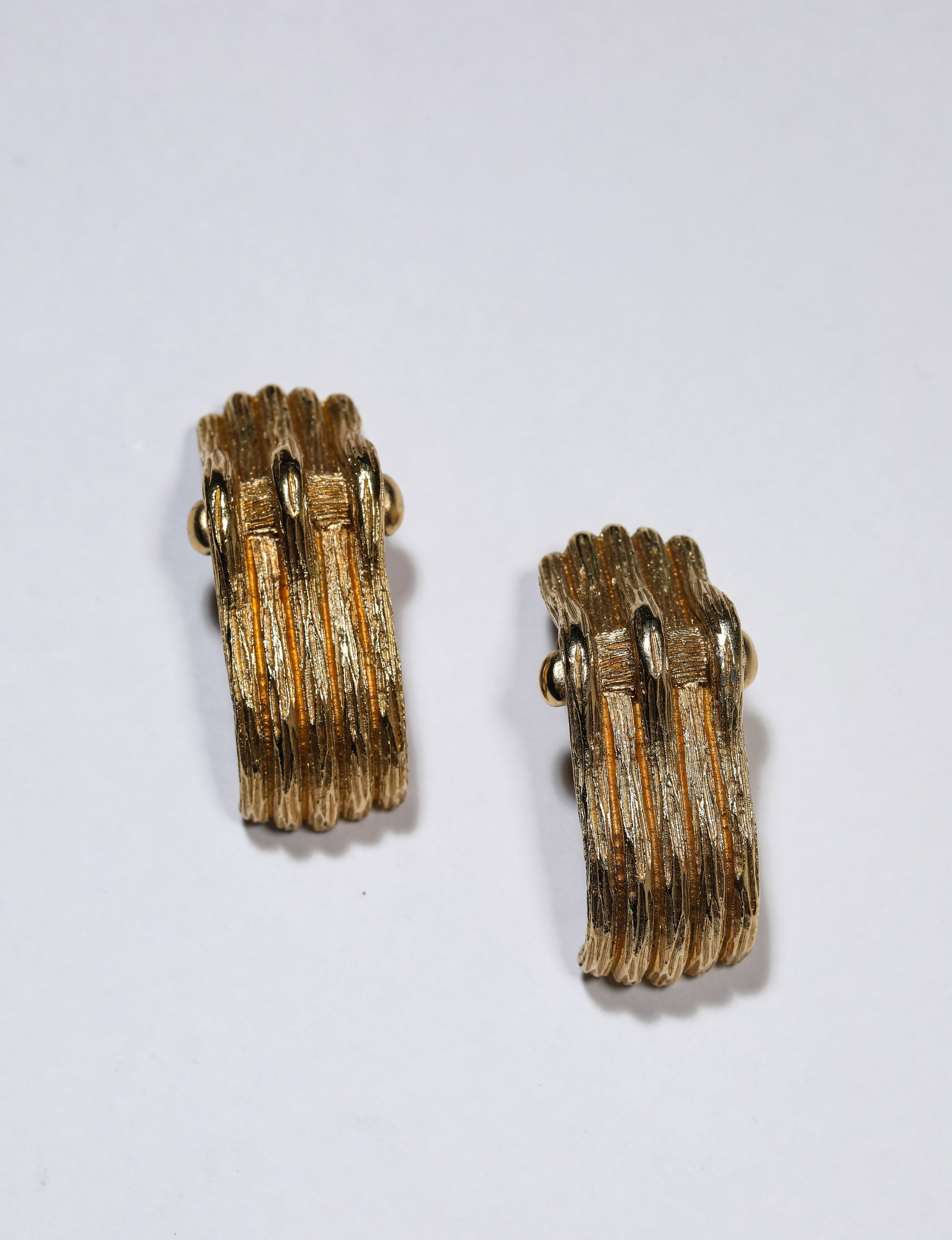 A Pair of Dior Earrings: Description: Dimensions: Weight: 25 g. Length: 1.8 cm x Width: 1.9 cm x Height: 3.8 cm. All measurements are approximate.