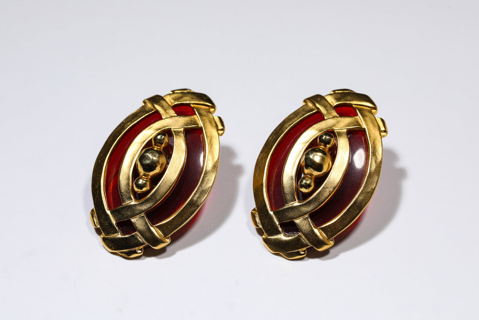 A Pair of Karl Lagerfeld Earrings: Description: Dimensions: Weight: 32 g. Width: 2.9 cm x Height: 4.5 cm. All measurements are approximate.