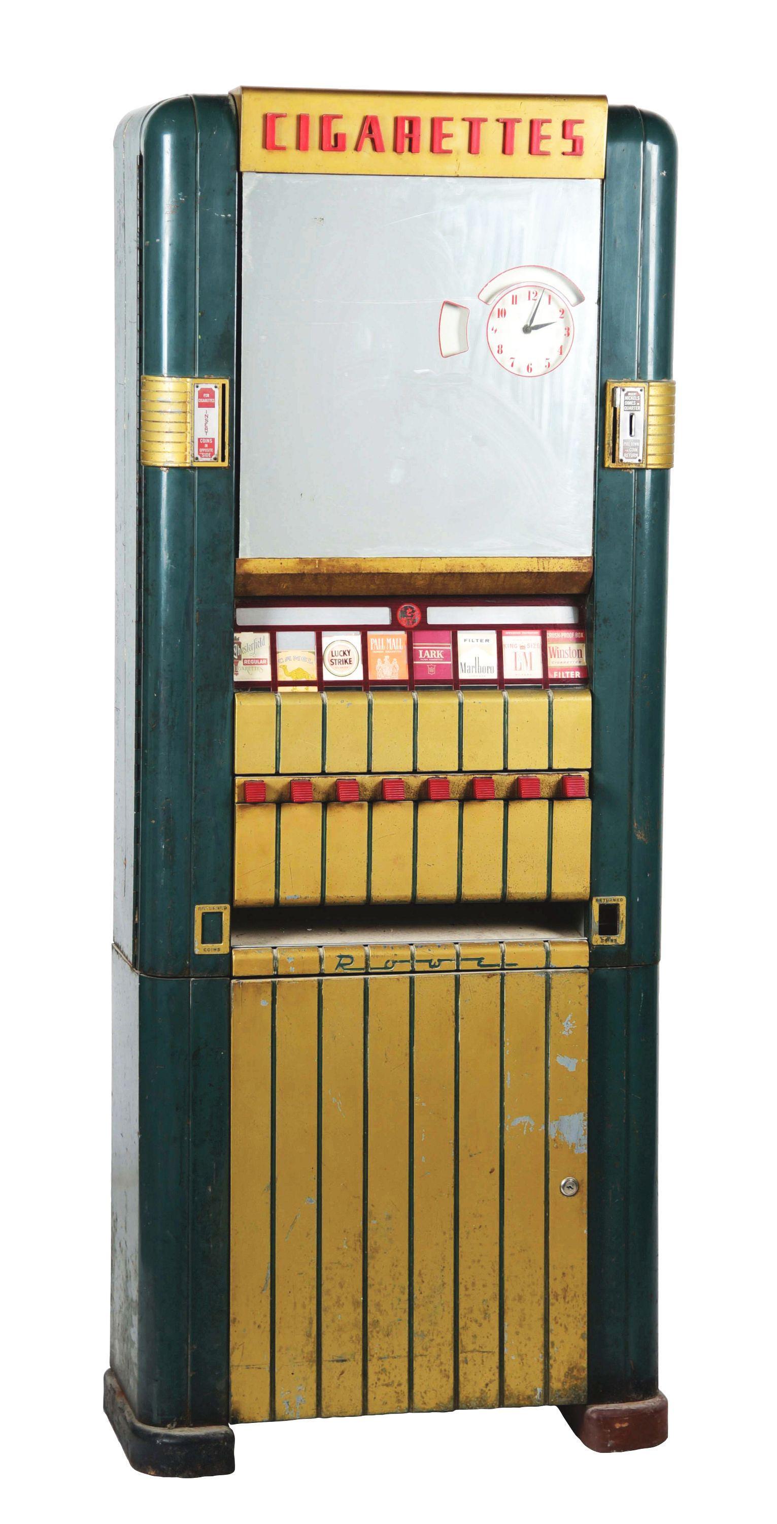 Original Rowe 25Â¢ Cigarette Machine: Original Rowe 25Â¢ cigarette machine with original paint. A great Art Deco look, the word "Cigarettes" on the top marquee above mirror lights up when plugged in. Clock runs when plugged in. A great
