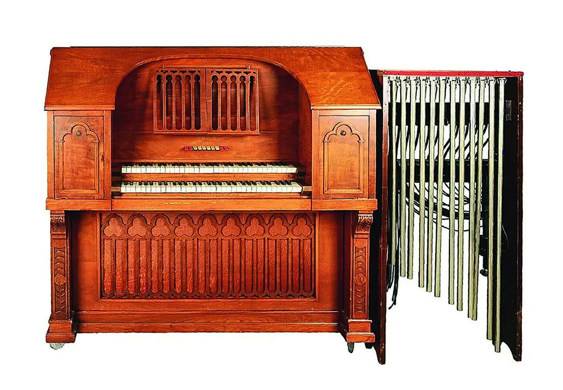 Seeburg Reproducing Pipe Organ with Extra Chime Rack: Seeburg reproducing pipe organ ca. 1920s with an extra rack of 12 hanging chimes (138,5 x 71 x 20 cm). These Gothic looking organs were intended for home and church use and could play four types of ro