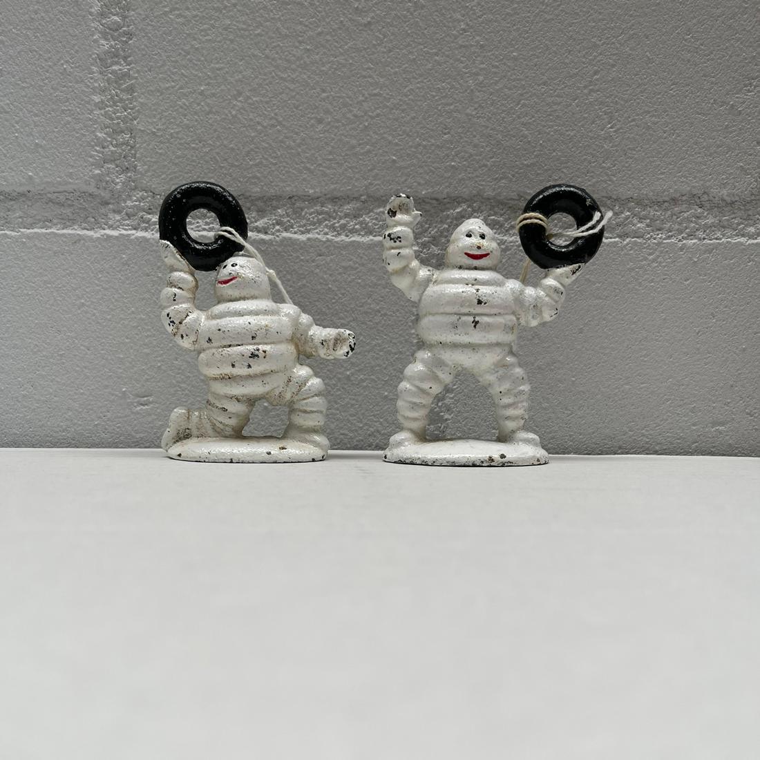 A Set of 2 Cast Iron Michelin Bibendum Figures (1 of 3)