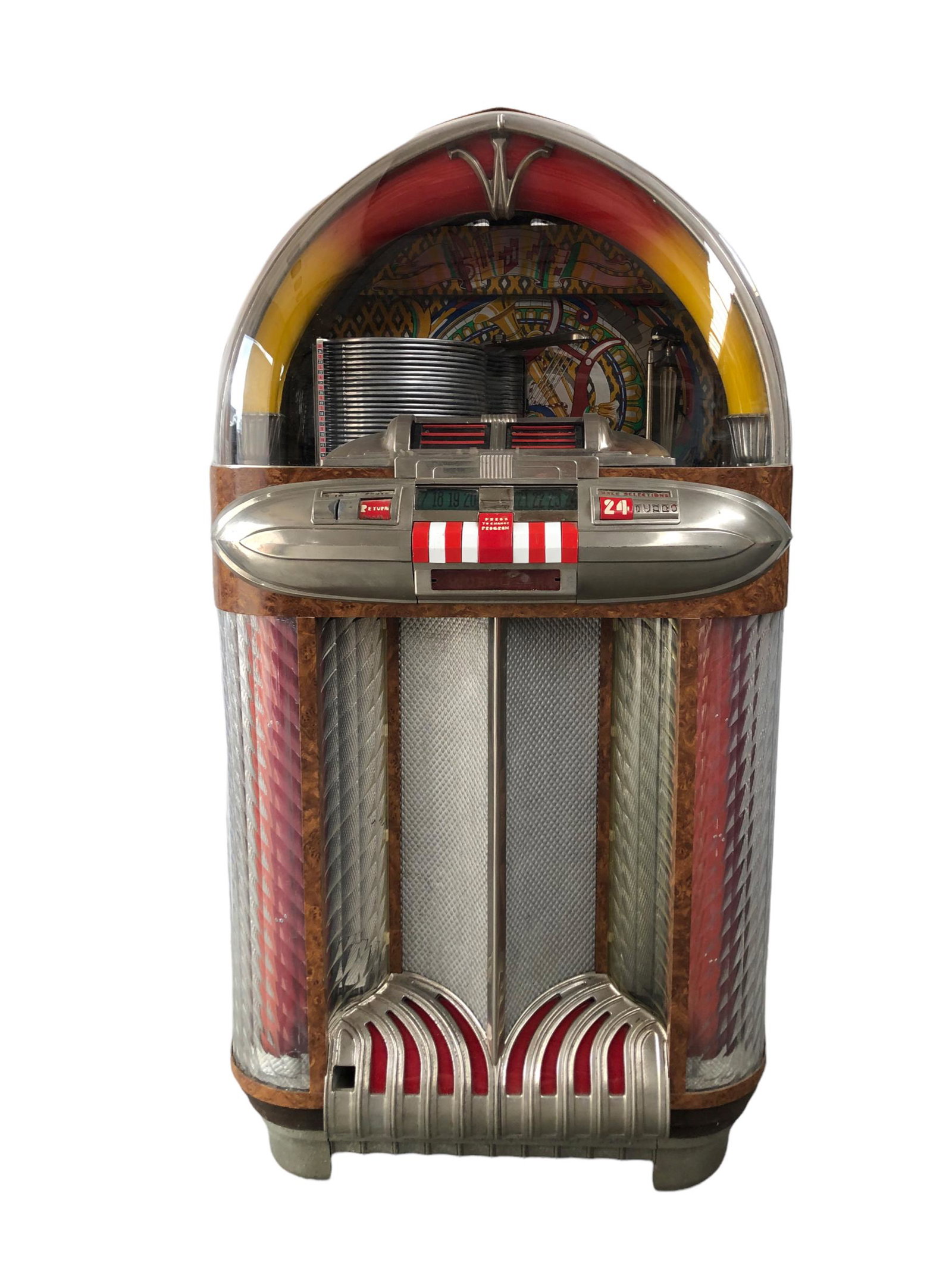 Wurlitzer Model 1100 "Bomber Nose" Jukebox, 1947-1949: Wurlitzer Model 1100 "Bomber Nose" Jukebox, made from 1947-1949, in good original condition. Wurlitzer Model 1100 tried to move away from 1940’s art deco design by using a number of stylistic elemen