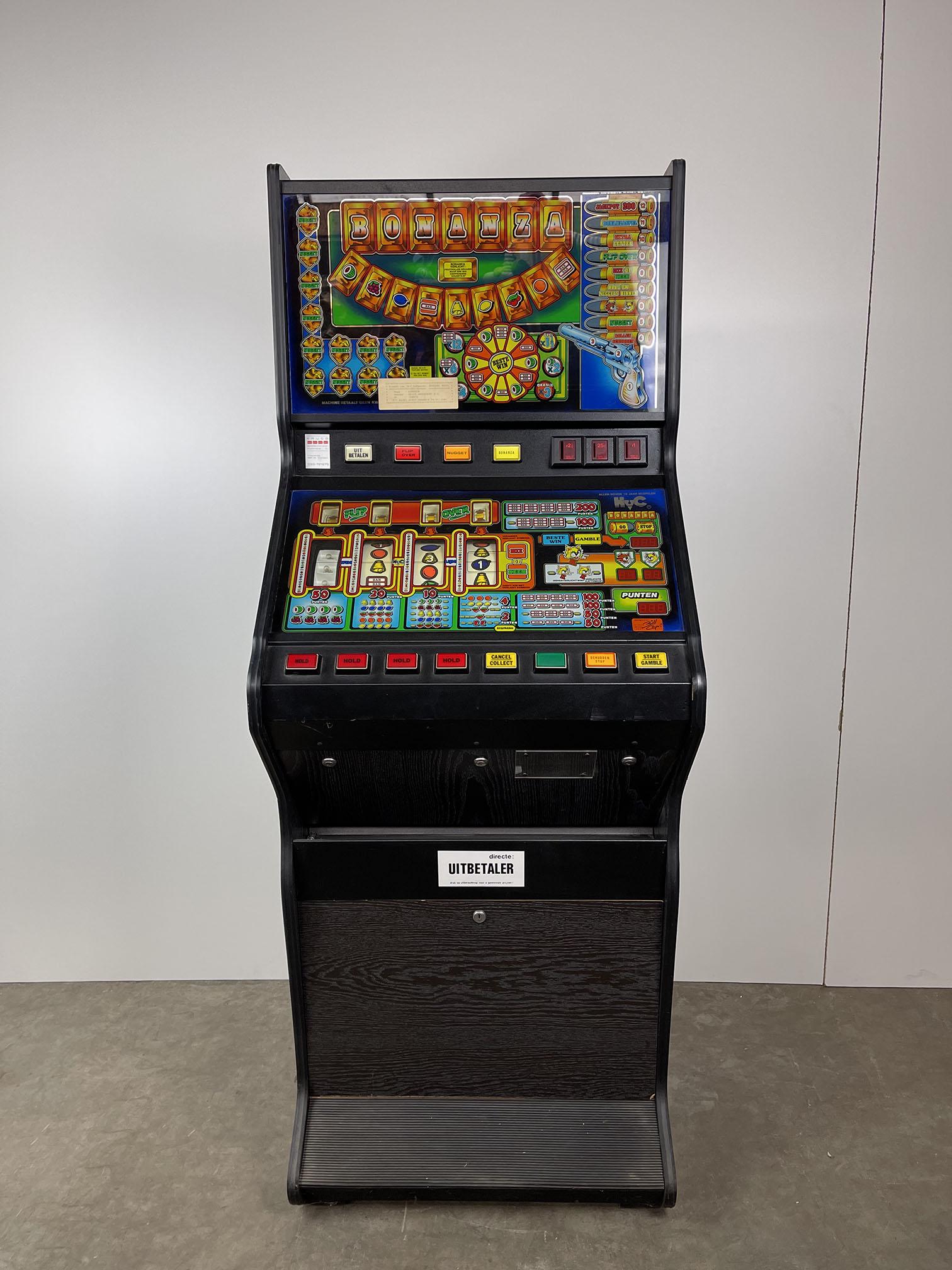 Dutch H.V.C. Bonanza Slot Machine: Dutch H.V.C. Bonanza slot machine, Amersfoort, Holland. Machine powers on, but the working condition hasn't been tested. Height: 190 cm. Width: 64 cm. Depth: 46 cm. Condition: Very good. Location: The