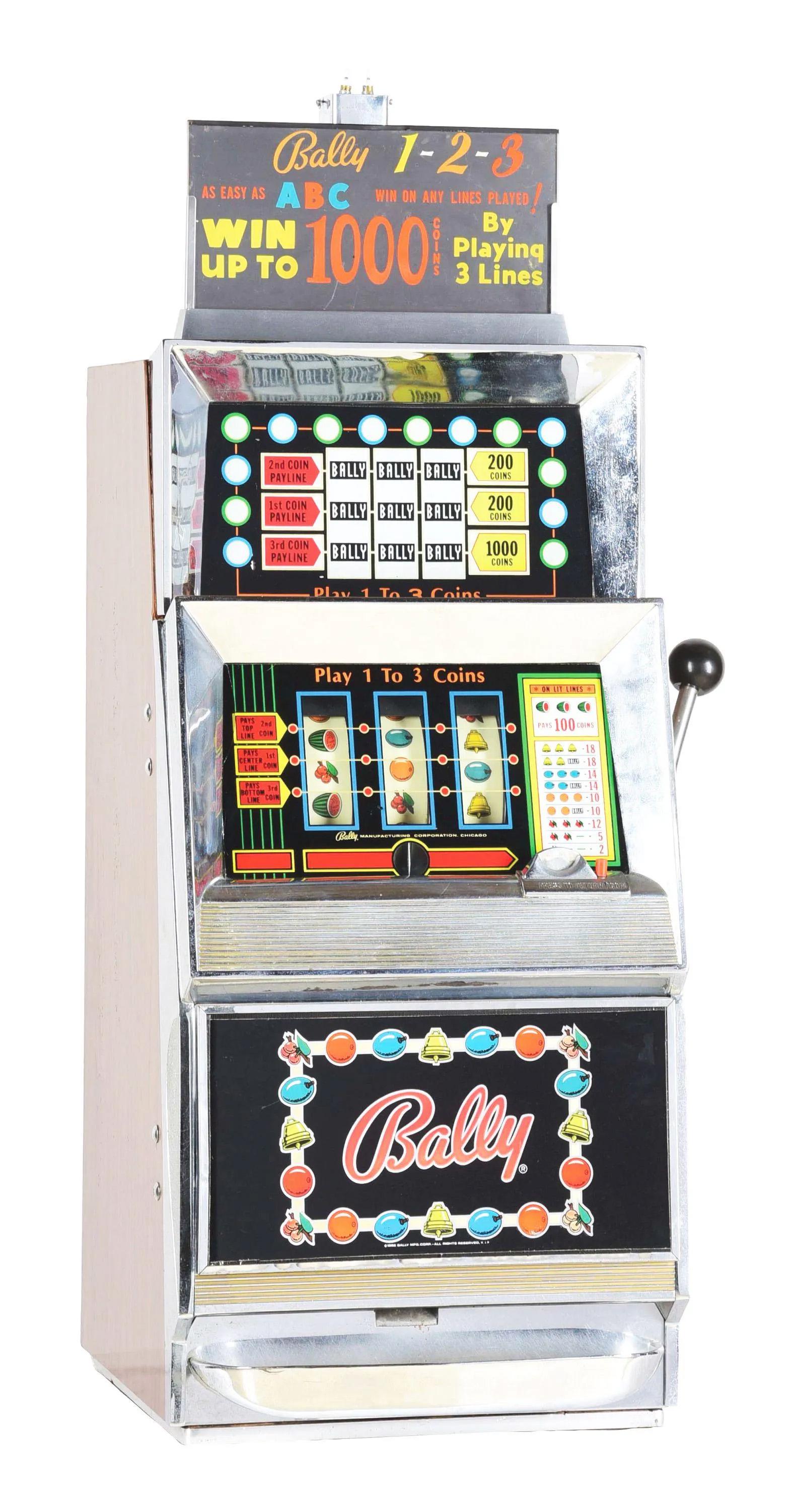 Bally Electro Mechanical Slot Machine: Machine features marquee and light on top, with original side manufacturing label reading "Bally Manufacturing Corporation Chicago, U.S.A Serial Number 831D". Glass panels are in excellent condition w