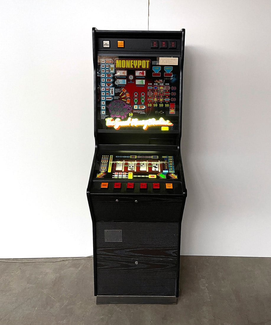 Dutch H.V.C. The Great Money Machine Slot Machine: Dutch H.V.C. "The Great Money Machine" slot machine. Powers on, working condition untested. Height: 189 cm. Width: 60 cm. Depth: 63 cm. Condition: Good. Location: The Netherlands, Tilburg.