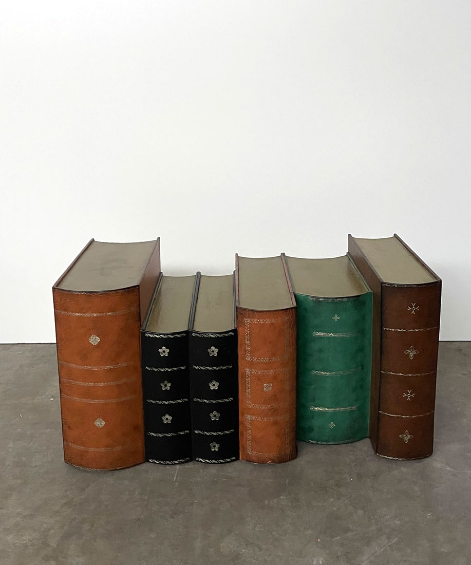 Interior Decoration with Leatherbound Book Design: Interior decoration with leatherbound book design that could also be used as a saloon/coffee table. This item is hollow and only weighs 1 kg. Made in the Philippines. Height: 82 cm. Width: 38 cm. Dept