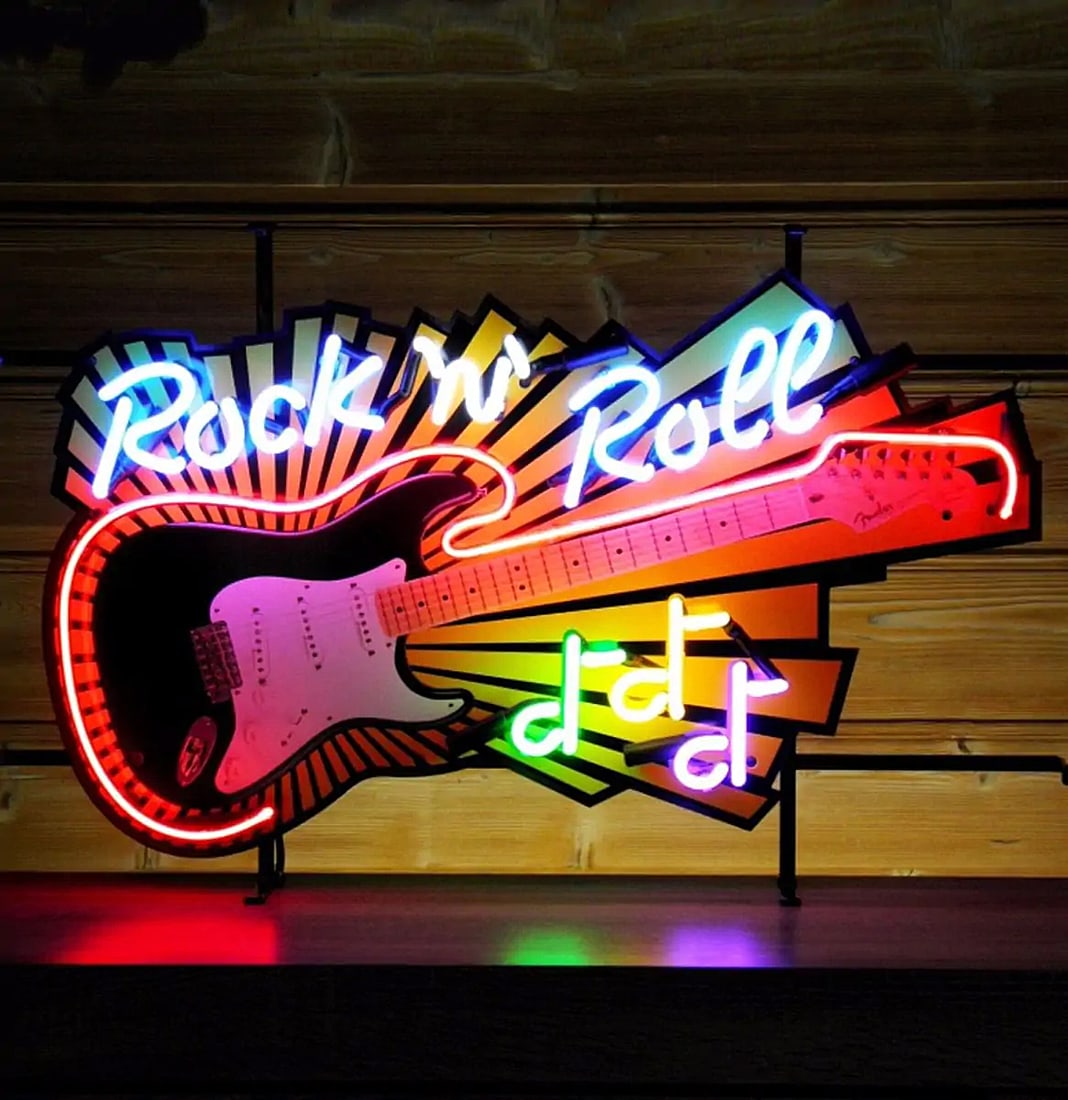 Rock n' Roll Guitar Neon Sign: Rock 'n' Roll neon sign with a printed Fender guitar backplate, so even when the neon is off it still looks cool! The neon sign is a great decoration for any kind of room and very easy to hang or plac