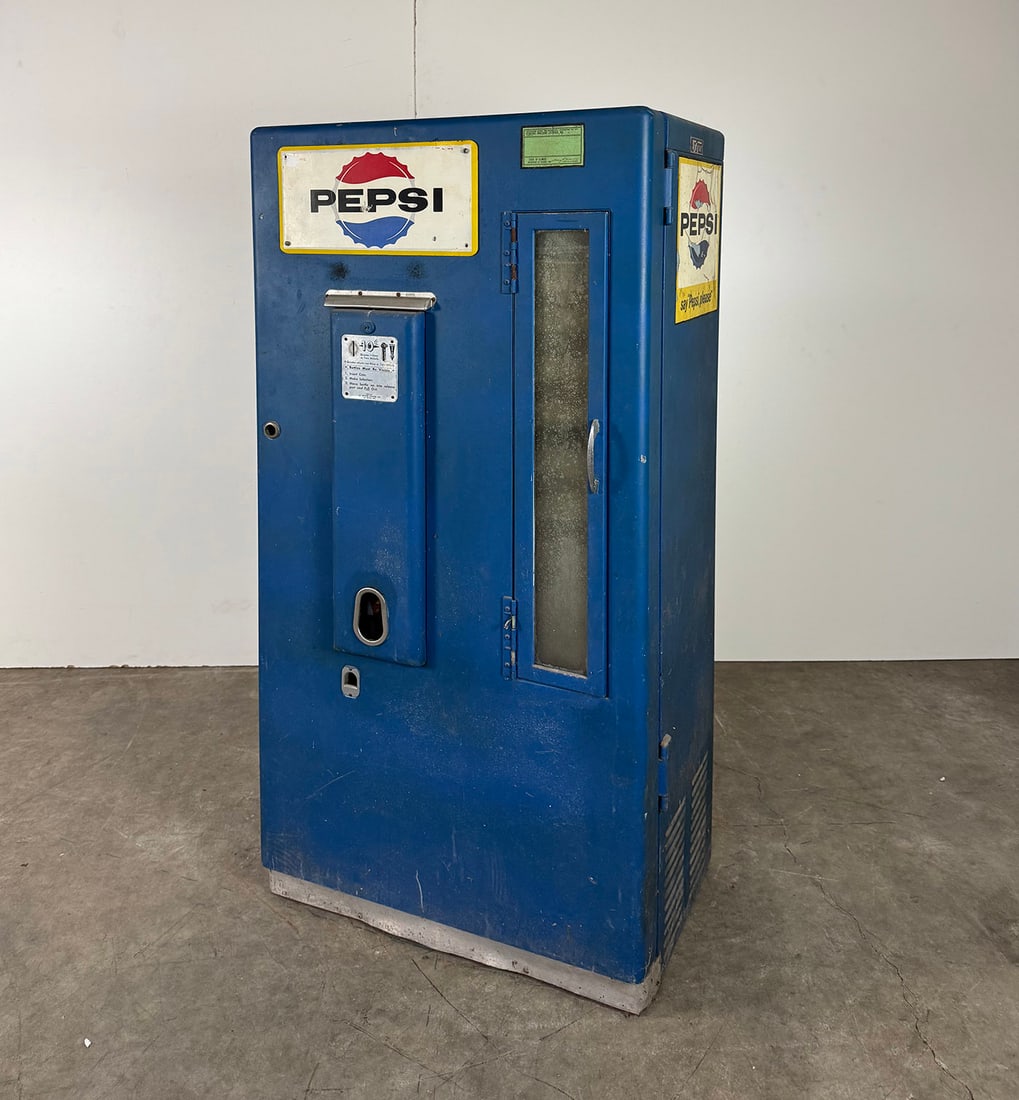 Pepsi-Cola Vending Machine: Pepsi-Cola Vending Machine late 50's. Unrestored, complete. Dimensions (H x W x D): 160 x 77 x 52 cm. Location: The Netherlands.