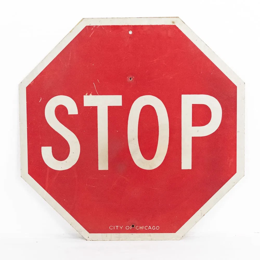City of Chicago Official Road Traffic Stop Sign: Official Road Traffic Stop Sign, traditional heavy duty stop sign, City of Chicago, single sided, scratches and scuff marks, two holes in center to attach to a pole. Location: The Netherlands, Tilburg