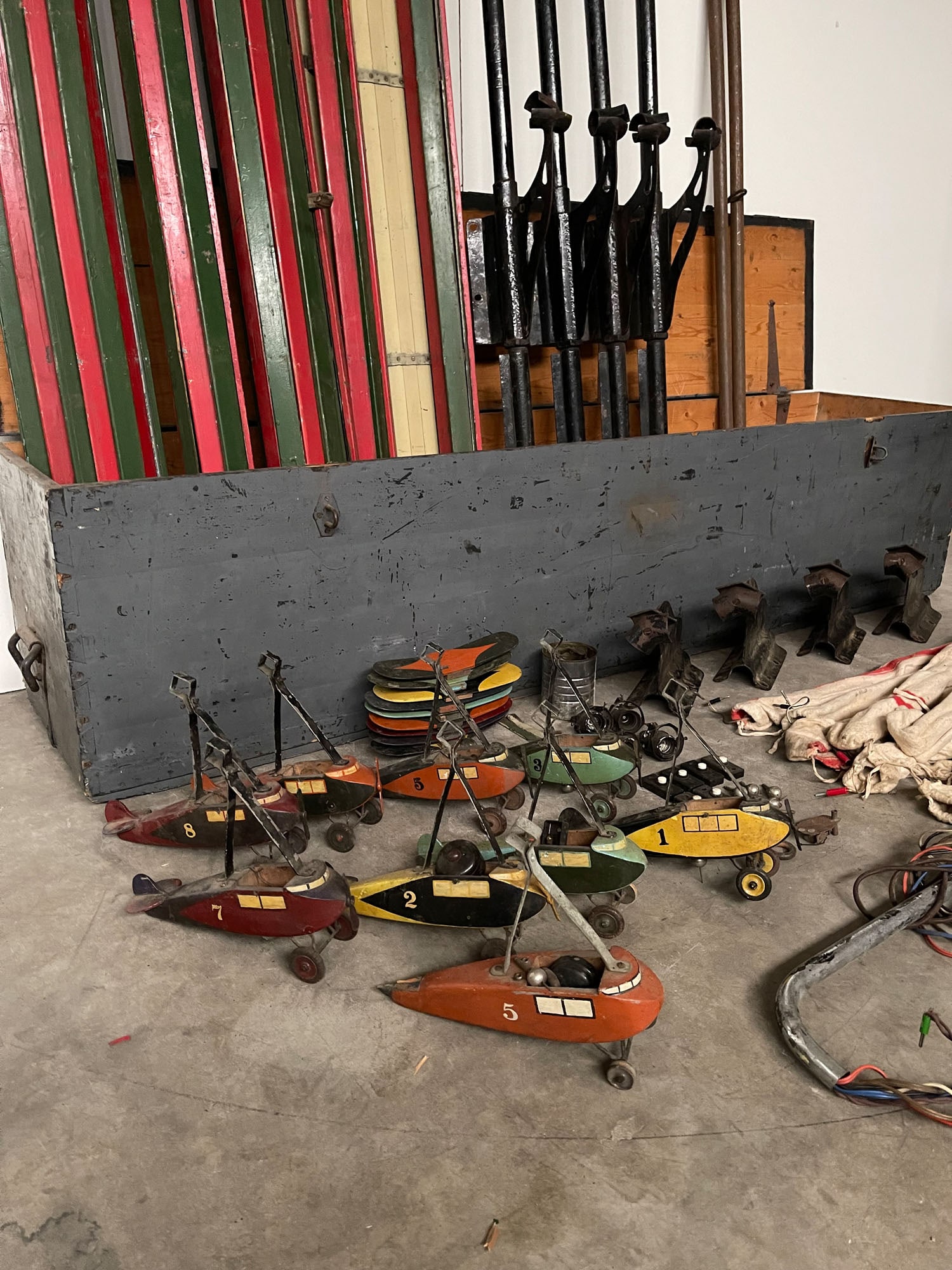 Antique Fairground Plane Attraction with Original Transport Crates: Antique fairground plane attraction that comes in 3 original transport crates. Crate 1: 53 x 129 x 100cm. Crate 2: 50 x 129 x 100cm. Crate 3: 53 x 220 x 50cm. Dimensions (H x W x D): 53 x 129 x 100 cm